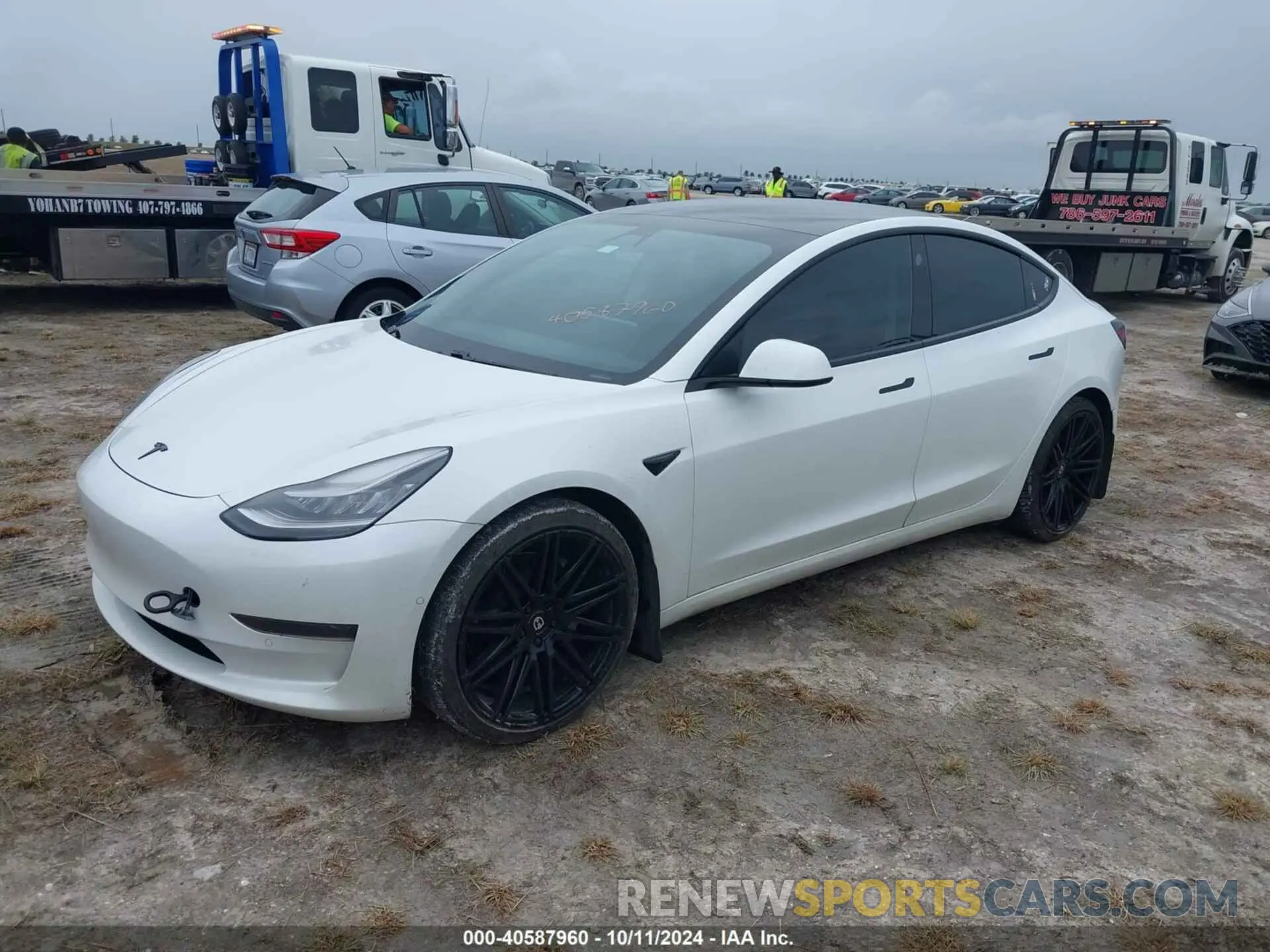 2 Photograph of a damaged car 5YJ3E1EA6MF852477 TESLA MODEL 3 2021