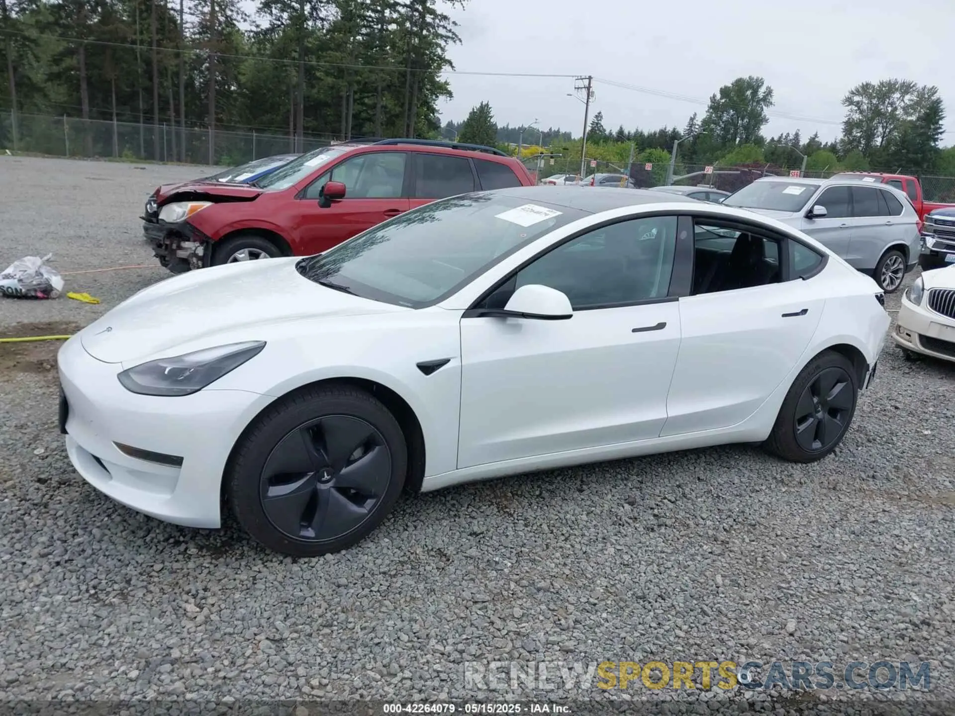 15 Photograph of a damaged car 5YJ3E1EA7MF098215 TESLA MODEL 3 2021
