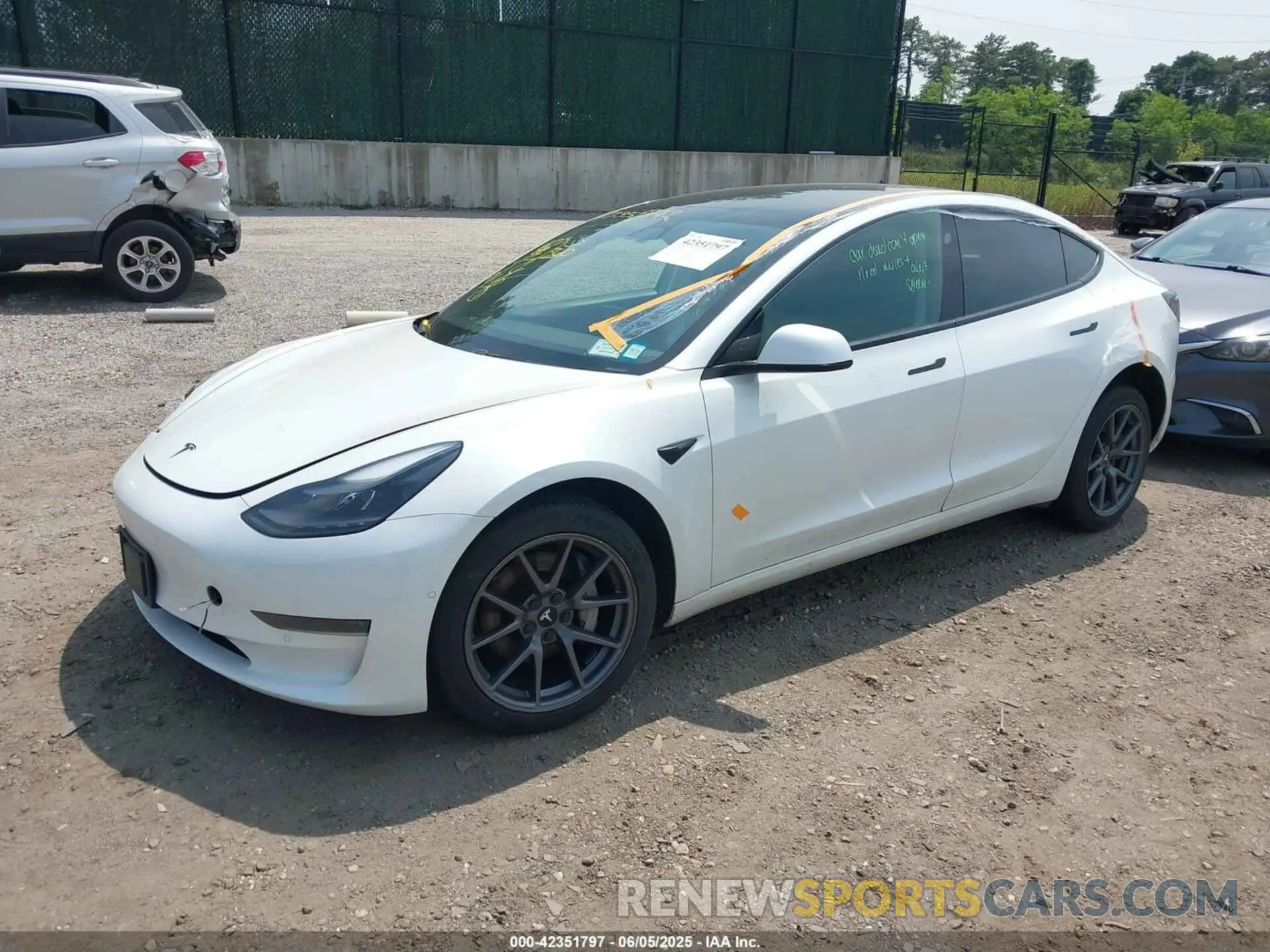 2 Photograph of a damaged car 5YJ3E1EA8MF871483 TESLA MODEL 3 2021