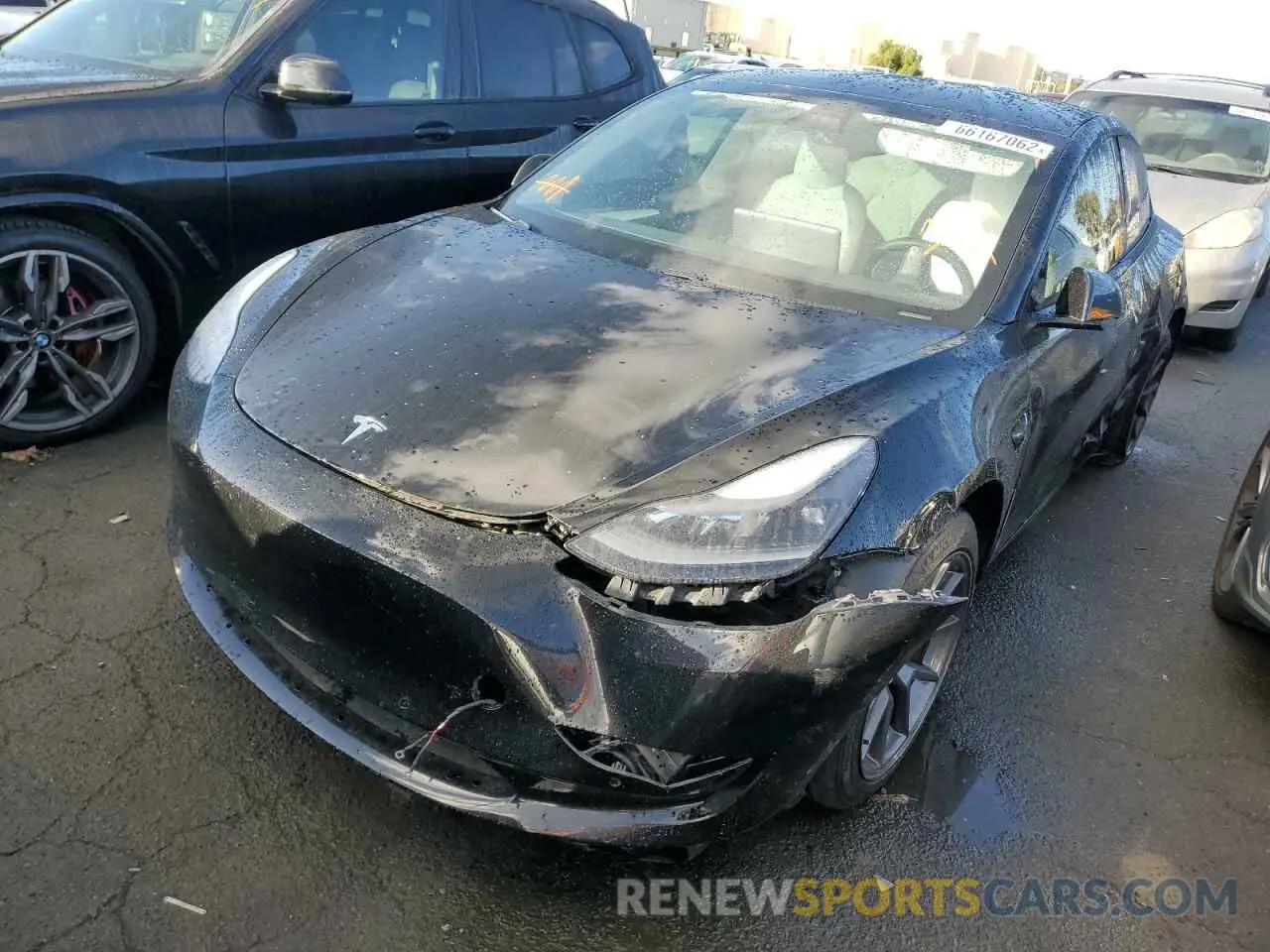 2 Photograph of a damaged car 5YJ3E1EA8MF987251 TESLA MODEL 3 2021