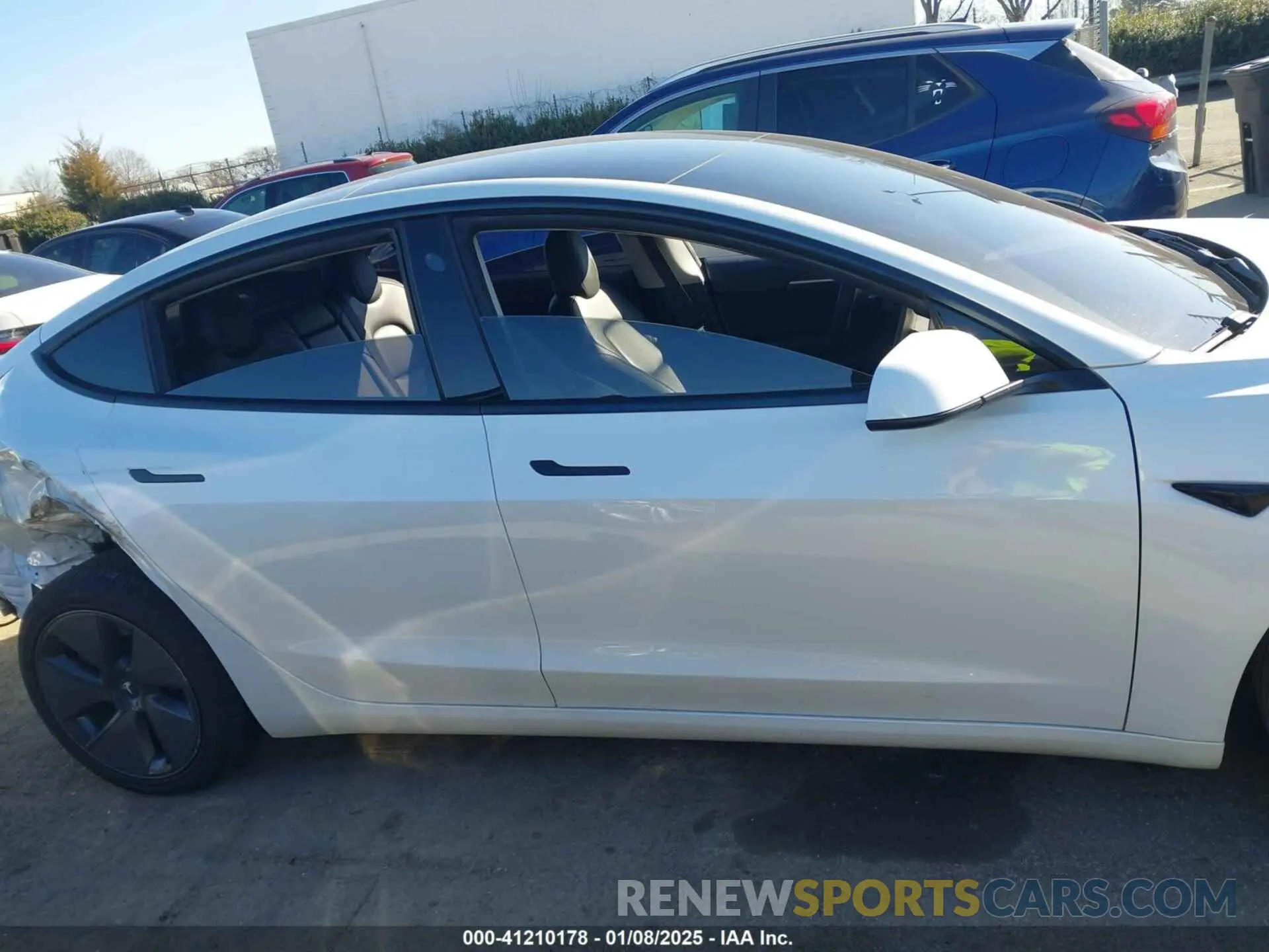 14 Photograph of a damaged car 5YJ3E1EA9MF031079 TESLA MODEL 3 2021