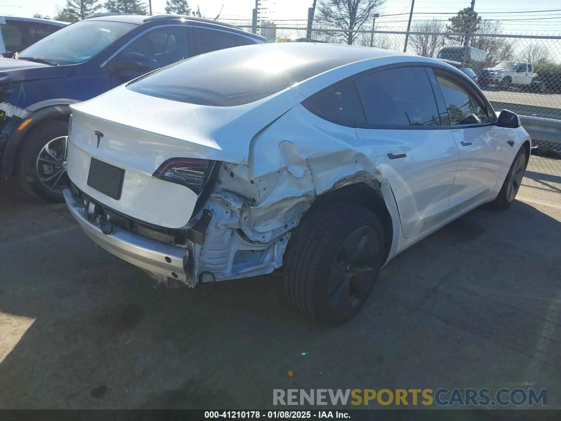 4 Photograph of a damaged car 5YJ3E1EA9MF031079 TESLA MODEL 3 2021