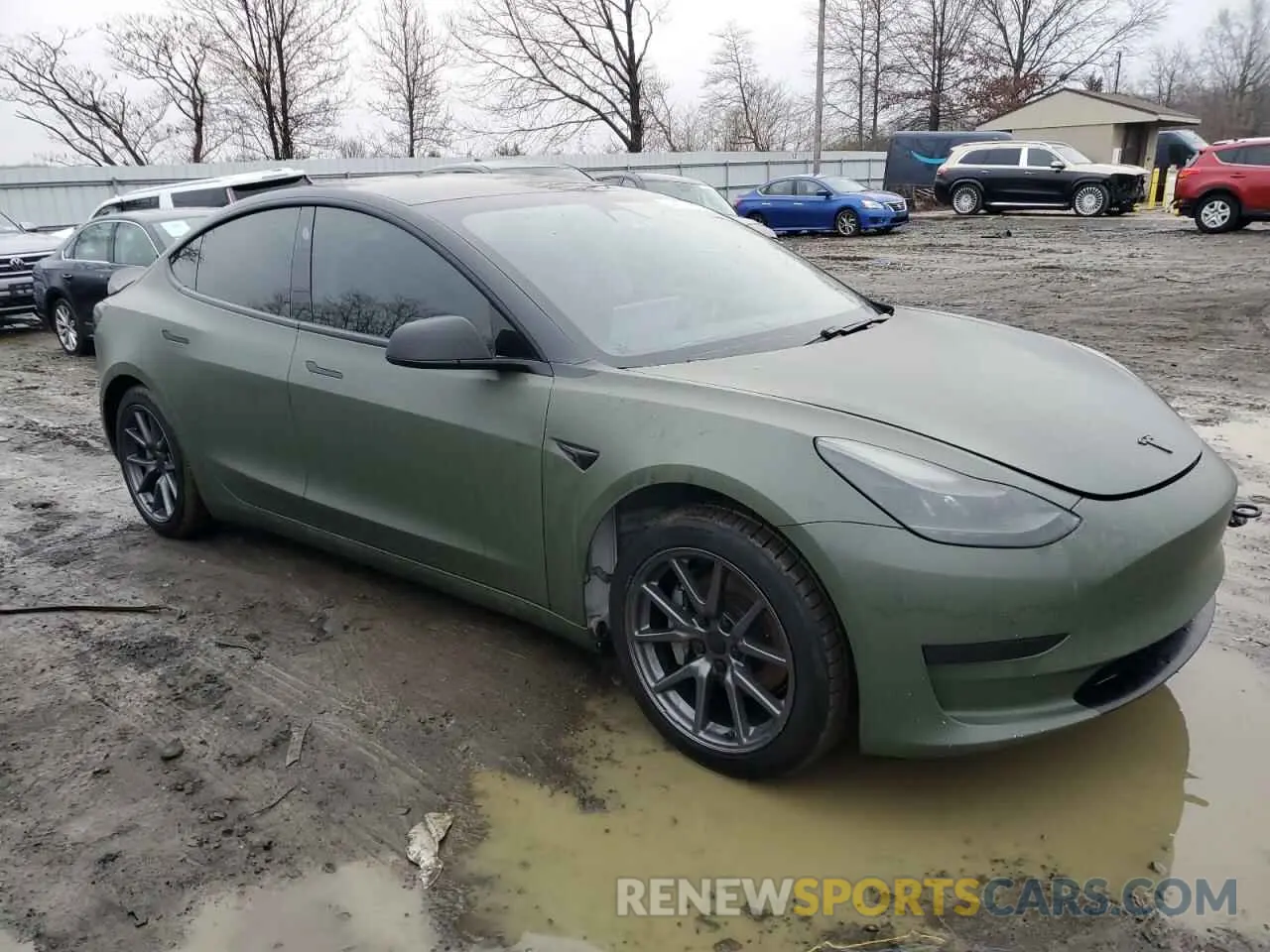 4 Photograph of a damaged car 5YJ3E1EA9MF906242 TESLA MODEL 3 2021