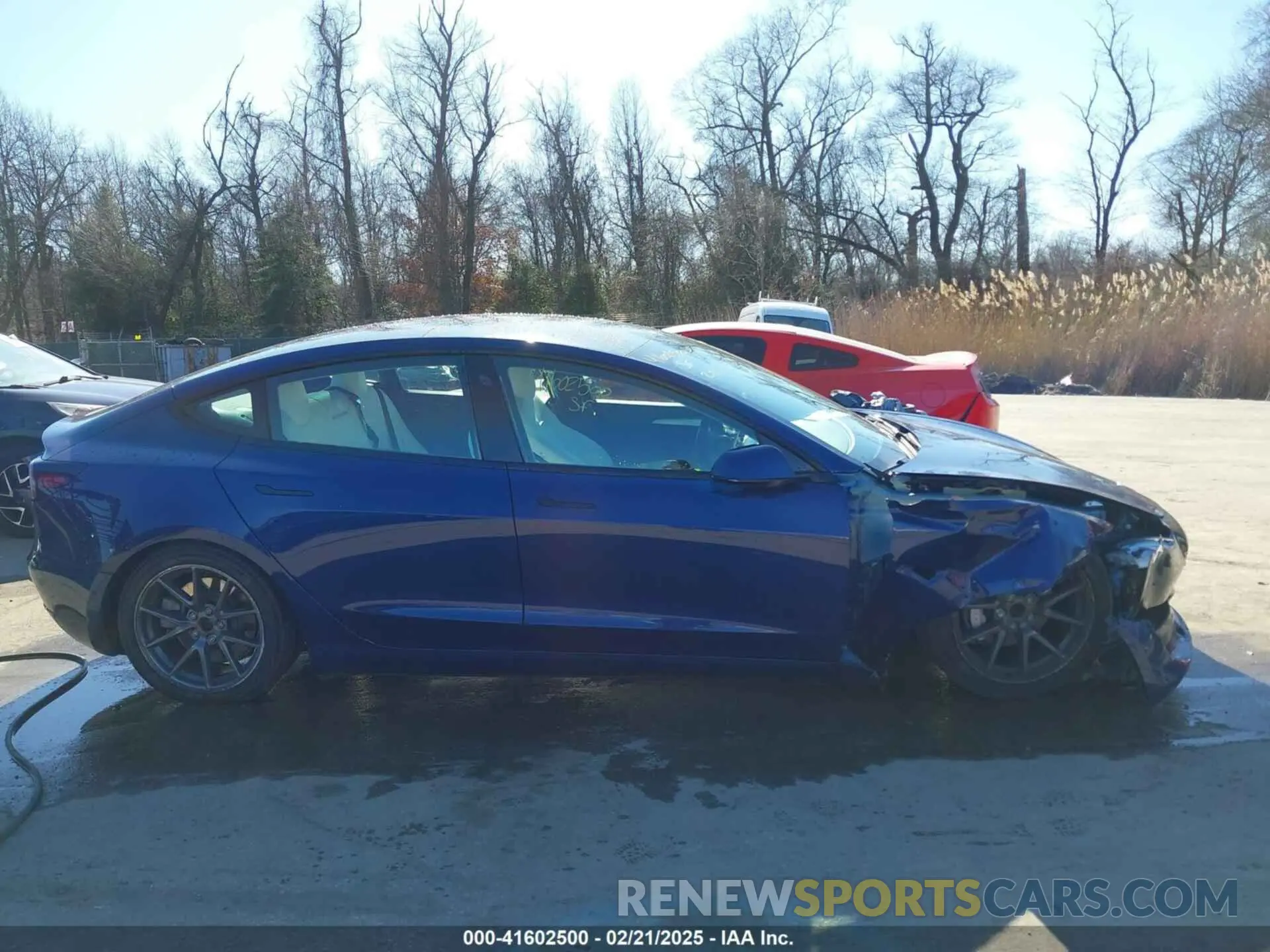 12 Photograph of a damaged car 5YJ3E1EA9MF978705 TESLA MODEL 3 2021