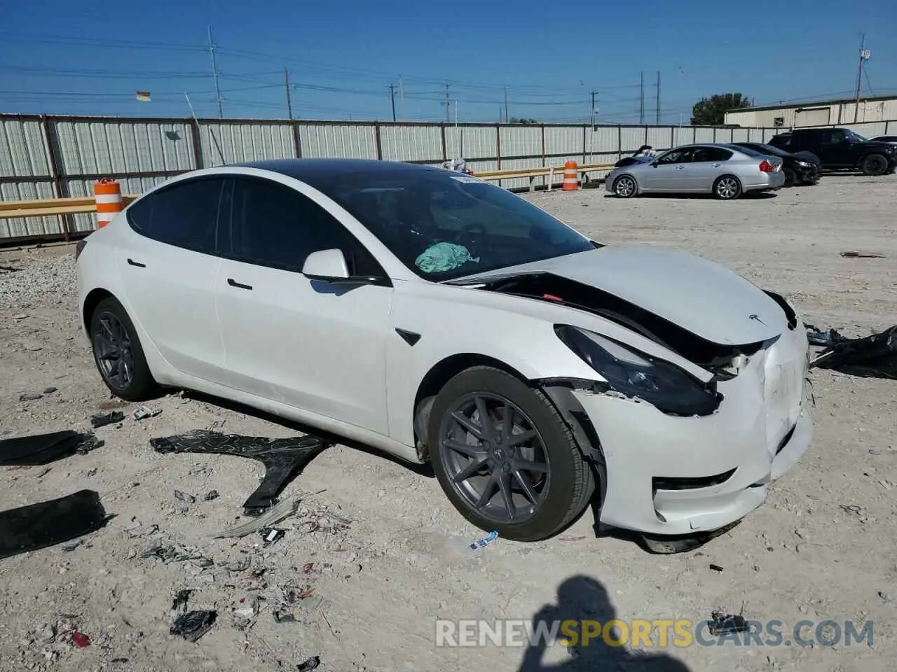 4 Photograph of a damaged car 5YJ3E1EAXMF030393 TESLA MODEL 3 2021