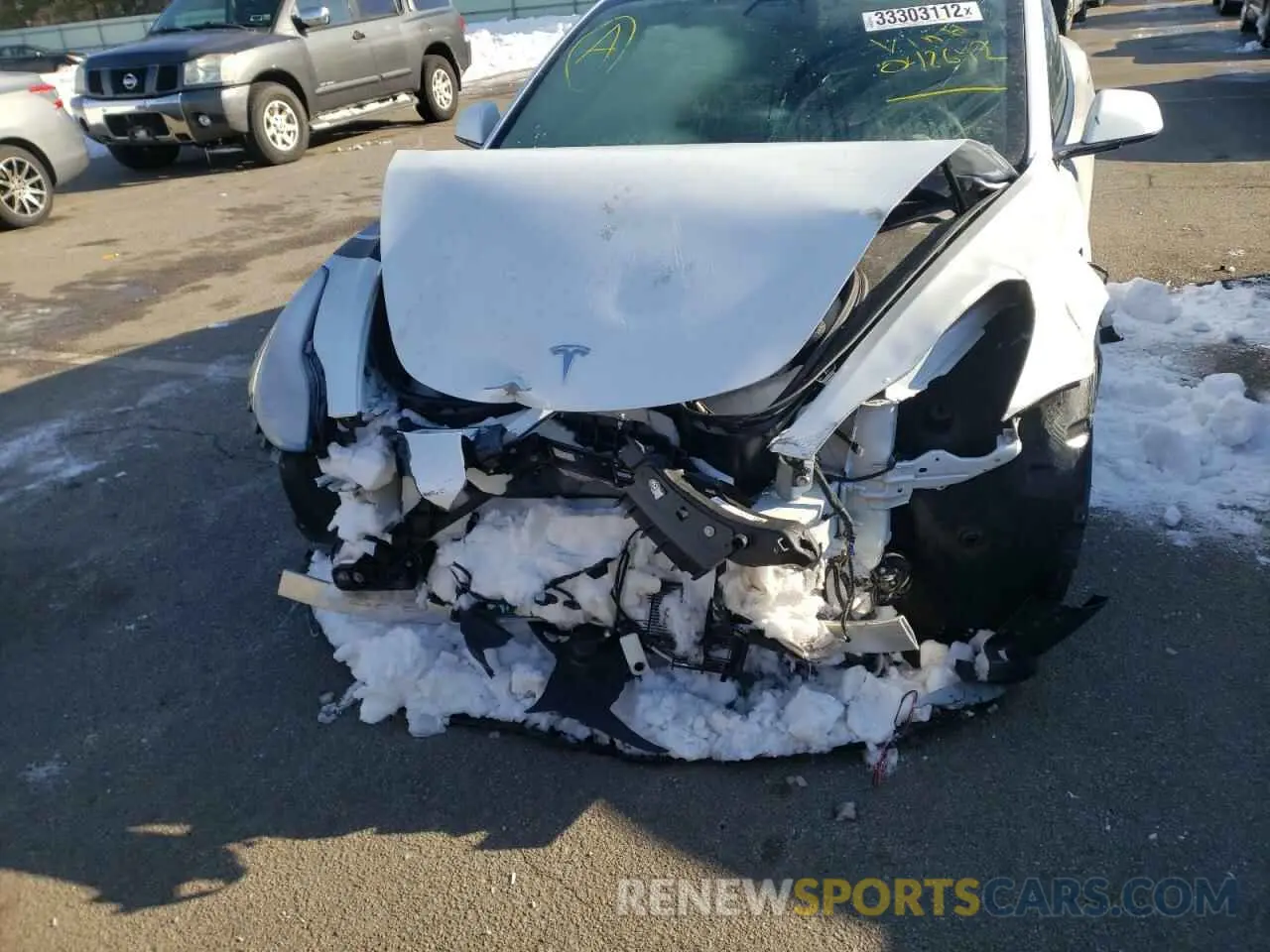 9 Photograph of a damaged car 5YJ3E1EAXMF042642 TESLA MODEL 3 2021