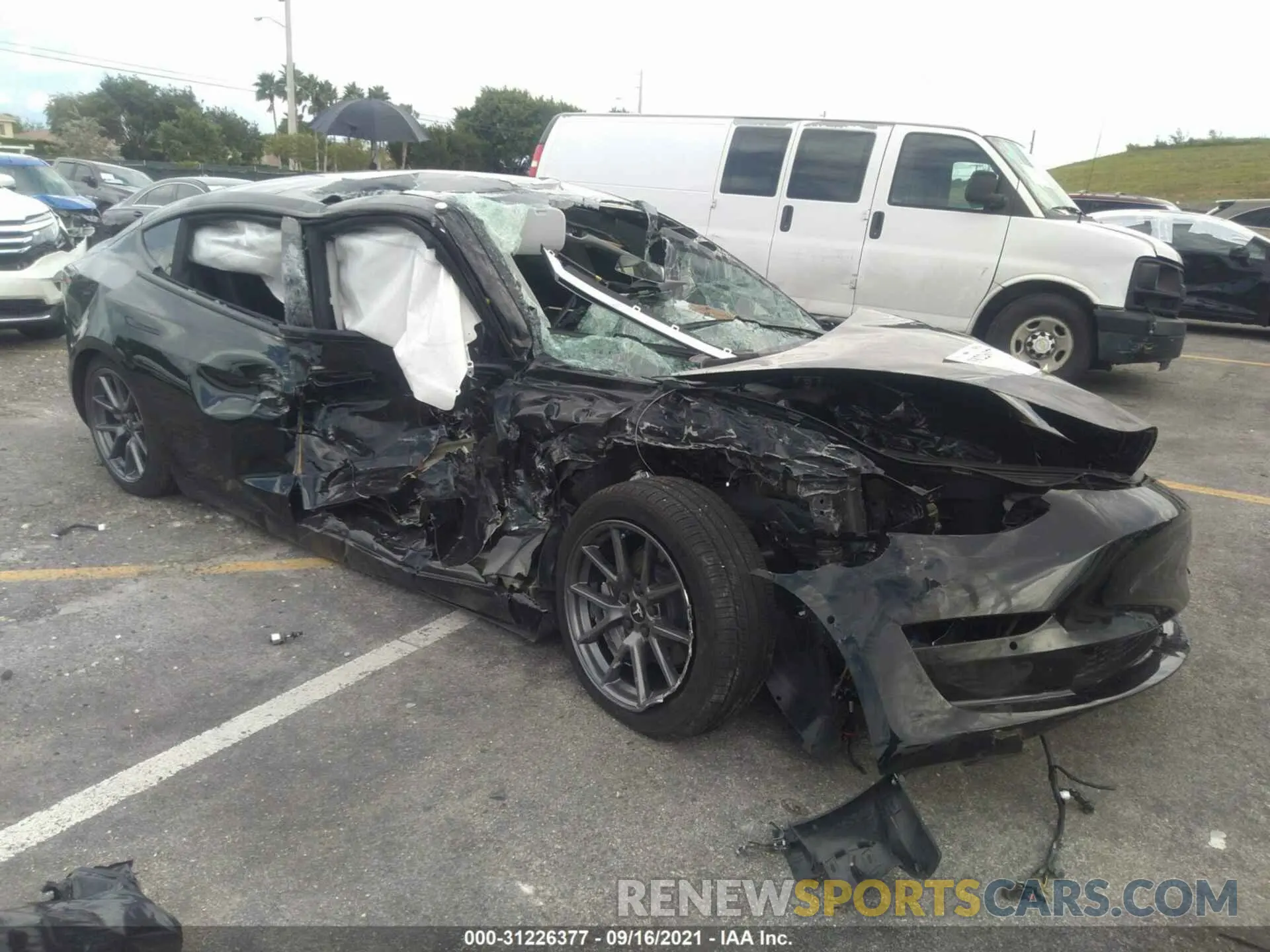1 Photograph of a damaged car 5YJ3E1EAXMF922255 TESLA MODEL 3 2021