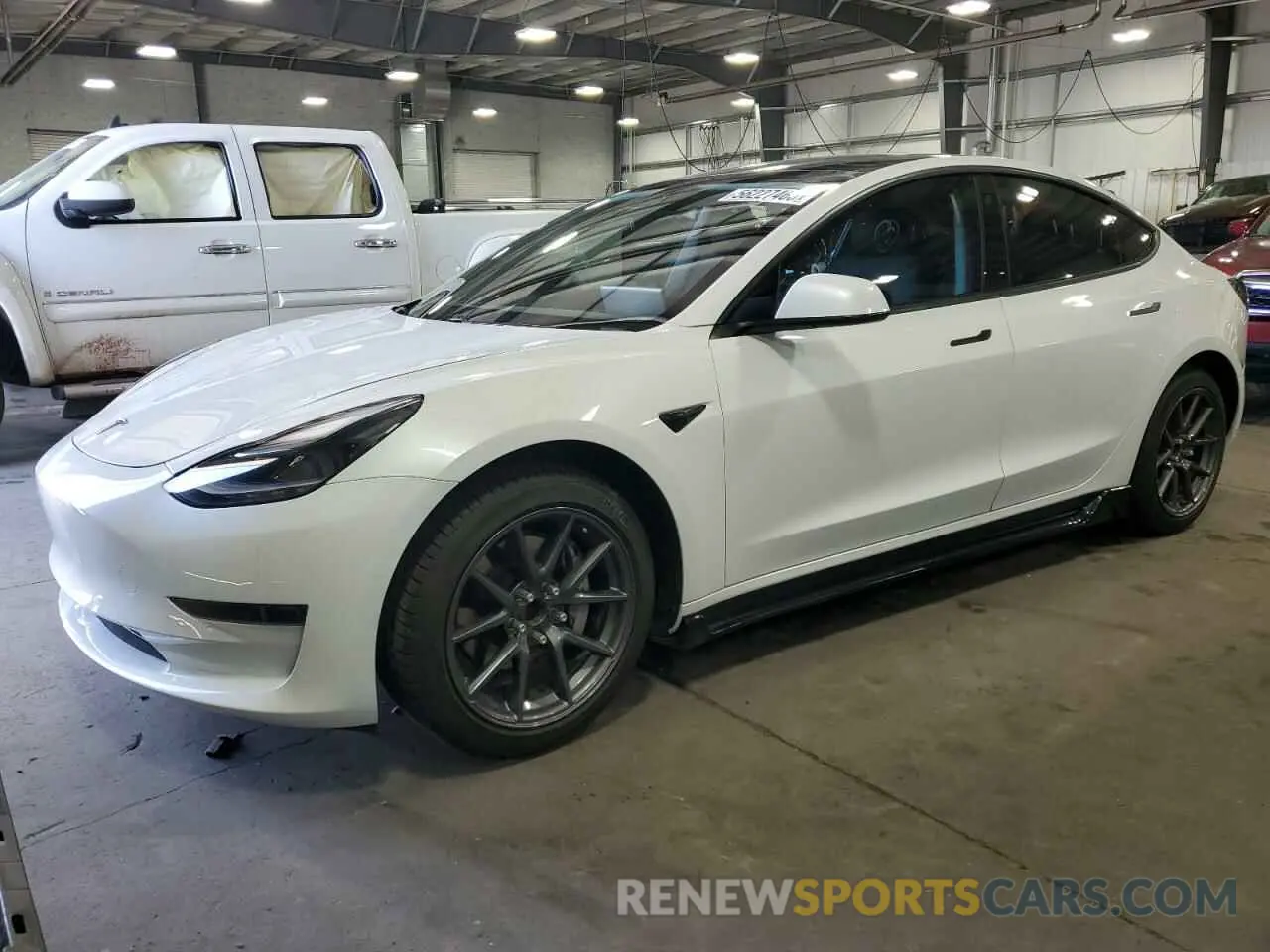 1 Photograph of a damaged car 5YJ3E1EAXMF991558 TESLA MODEL 3 2021