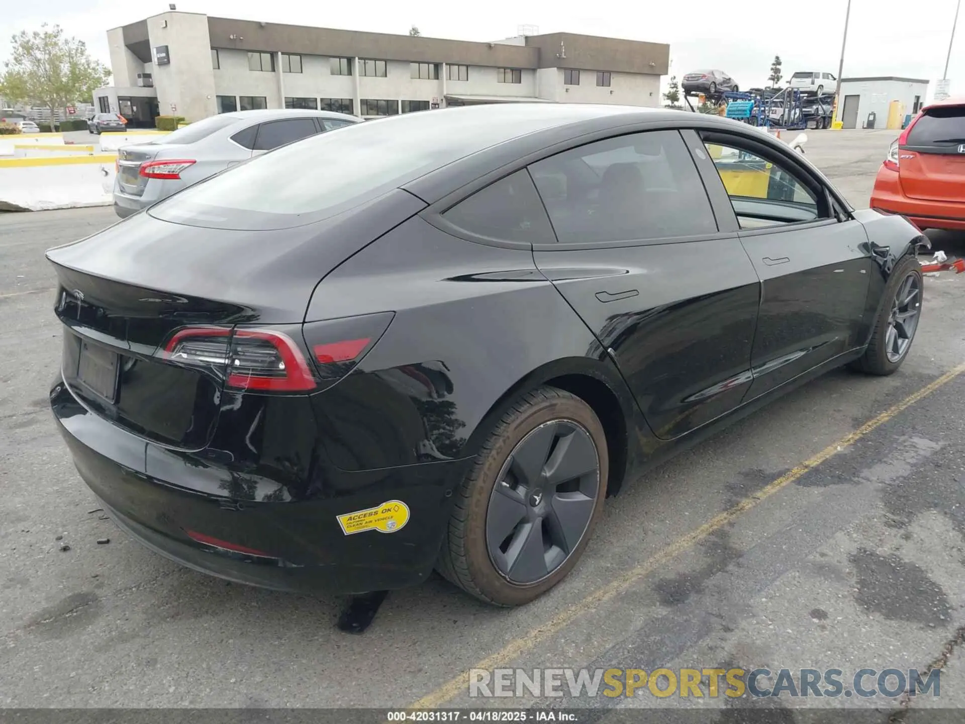 4 Photograph of a damaged car 5YJ3E1EAXMF997084 TESLA MODEL 3 2021
