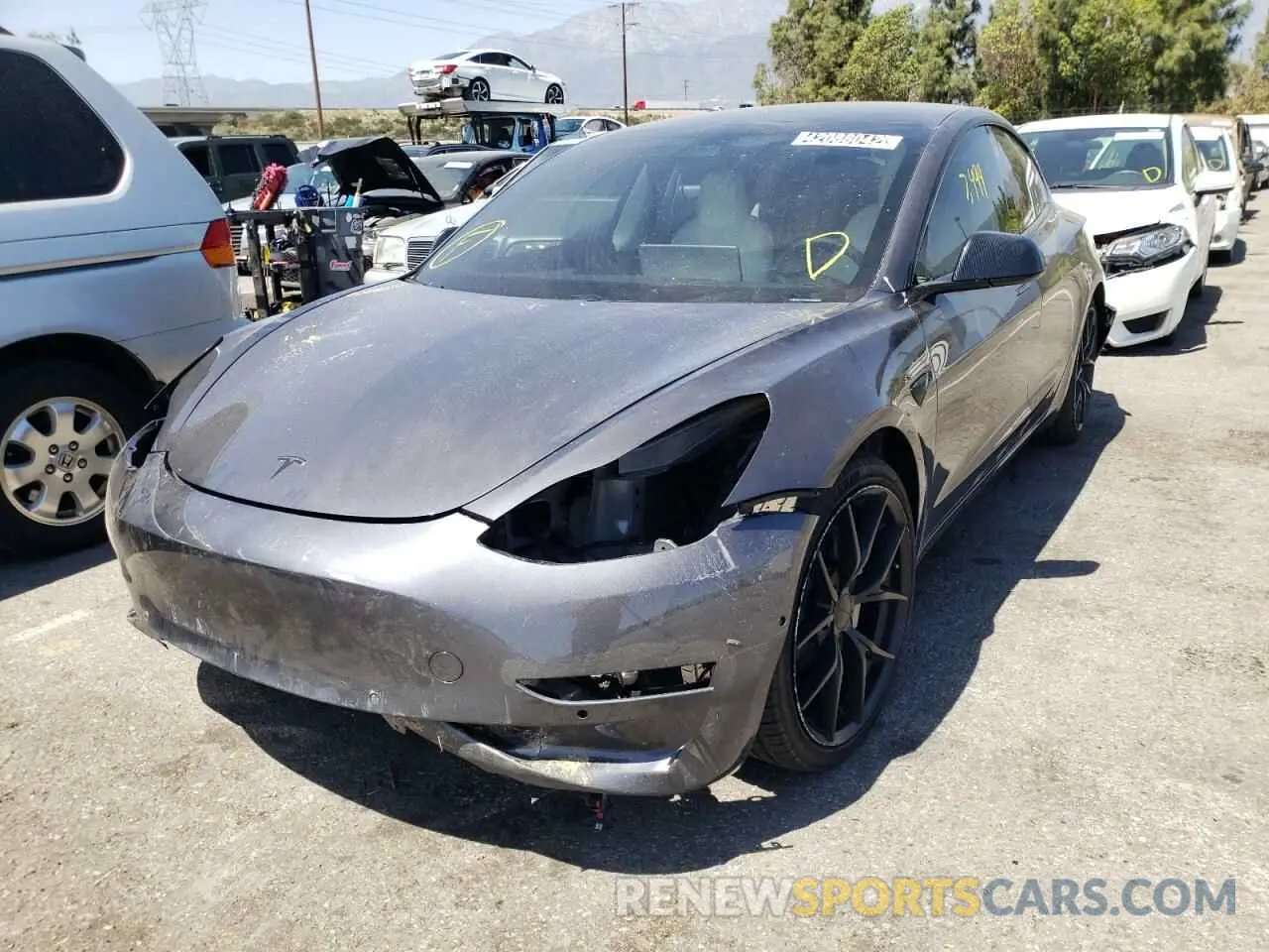 2 Photograph of a damaged car 5YJ3E1EB0MF054677 TESLA MODEL 3 2021