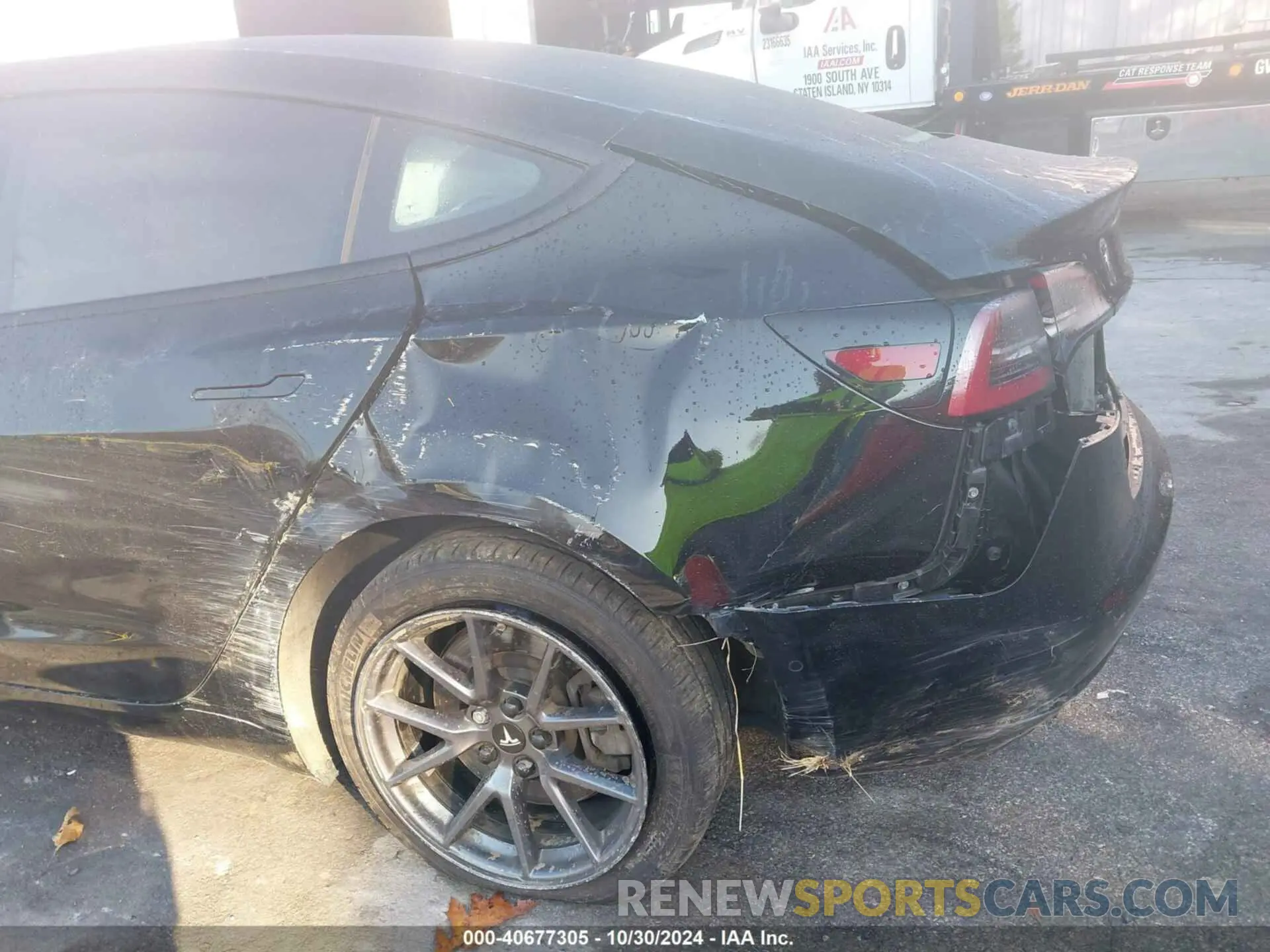 11 Photograph of a damaged car 5YJ3E1EB0MF858428 TESLA MODEL 3 2021