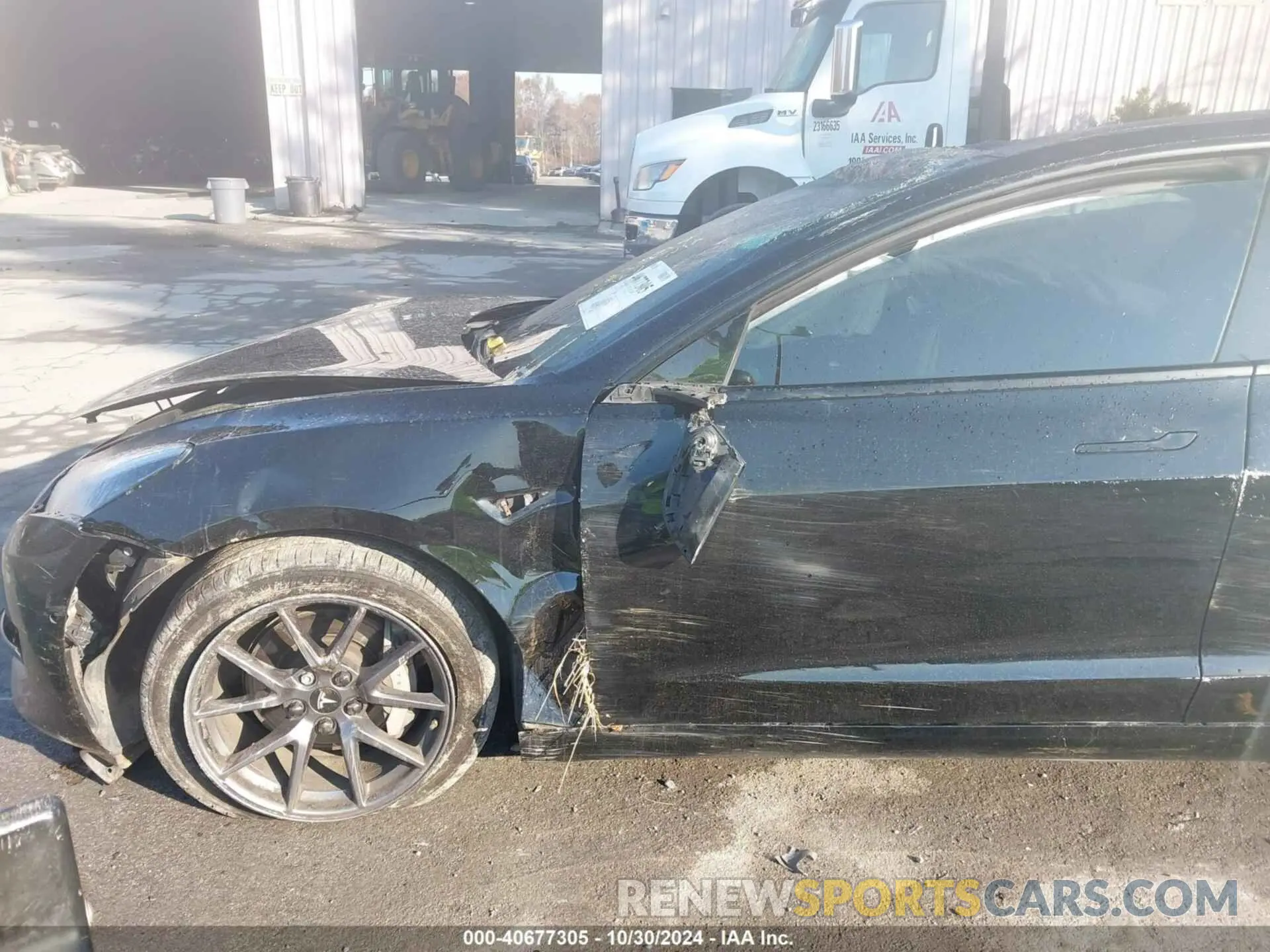 12 Photograph of a damaged car 5YJ3E1EB0MF858428 TESLA MODEL 3 2021
