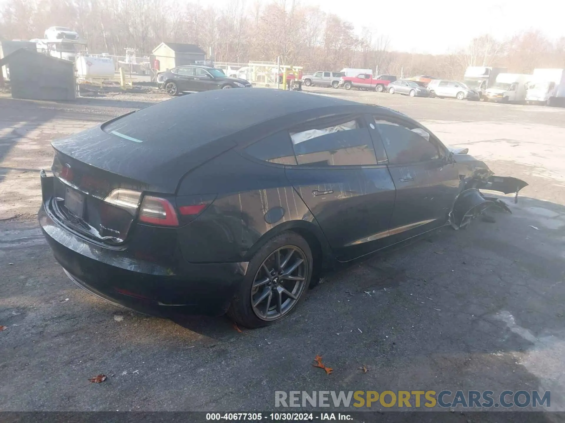 4 Photograph of a damaged car 5YJ3E1EB0MF858428 TESLA MODEL 3 2021