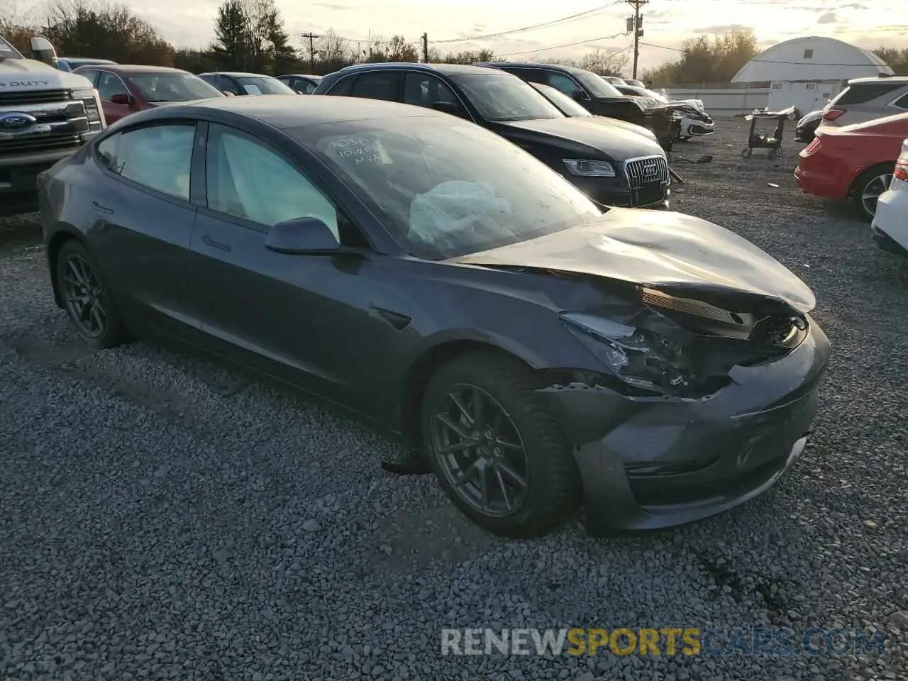 4 Photograph of a damaged car 5YJ3E1EB0MF979640 TESLA MODEL 3 2021