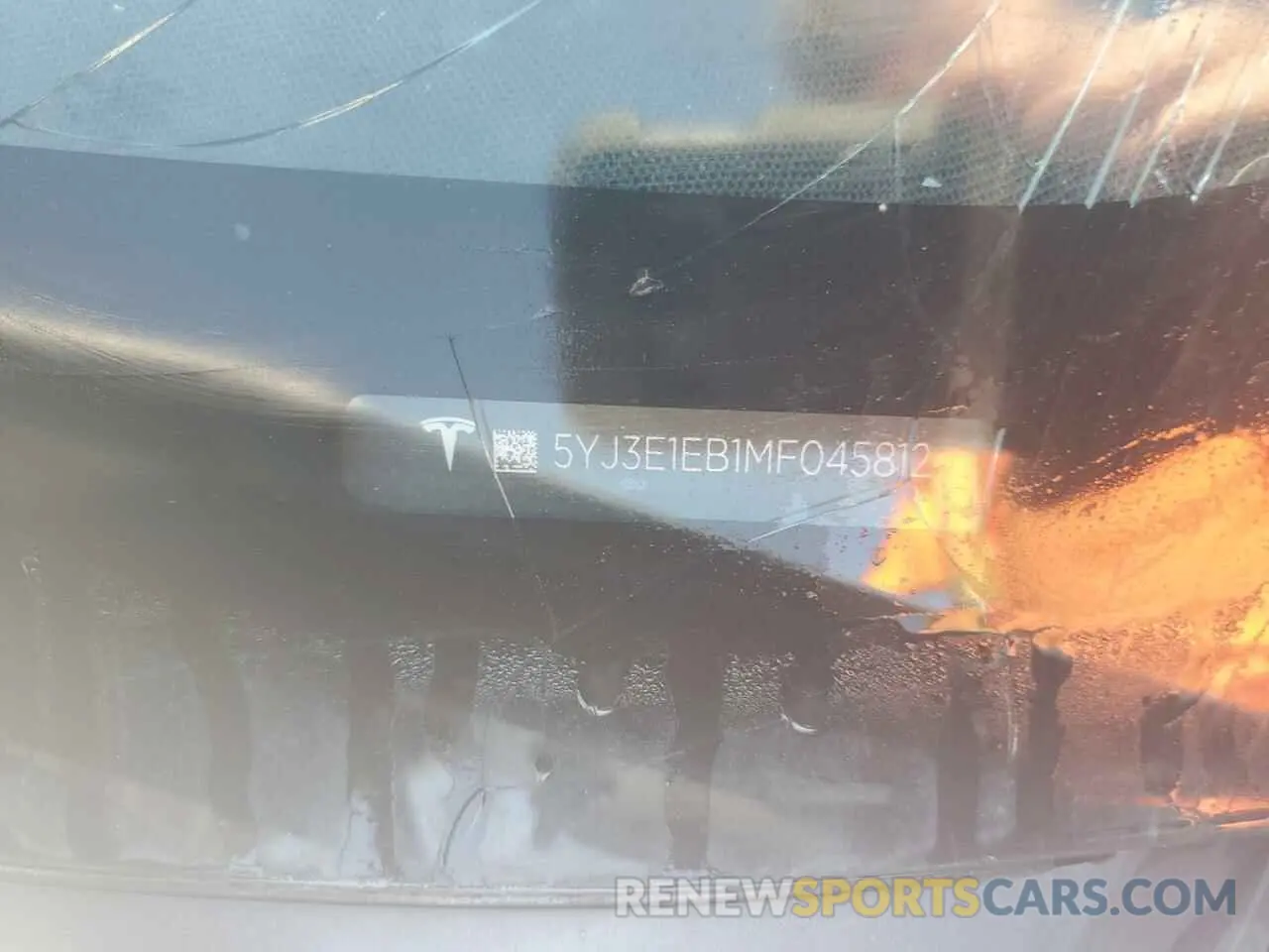 12 Photograph of a damaged car 5YJ3E1EB1MF045812 TESLA MODEL 3 2021