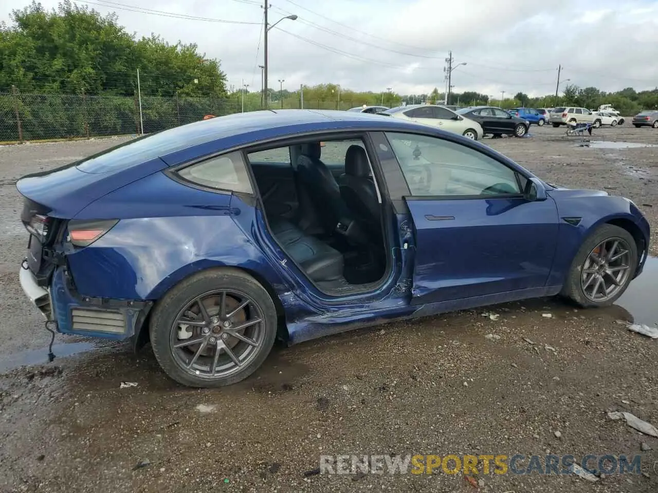 3 Photograph of a damaged car 5YJ3E1EB1MF063971 TESLA MODEL 3 2021