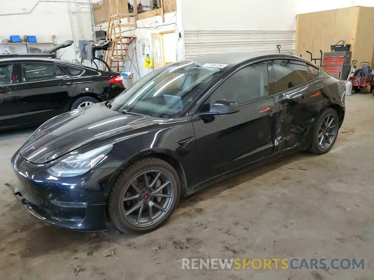 1 Photograph of a damaged car 5YJ3E1EB1MF857949 TESLA MODEL 3 2021