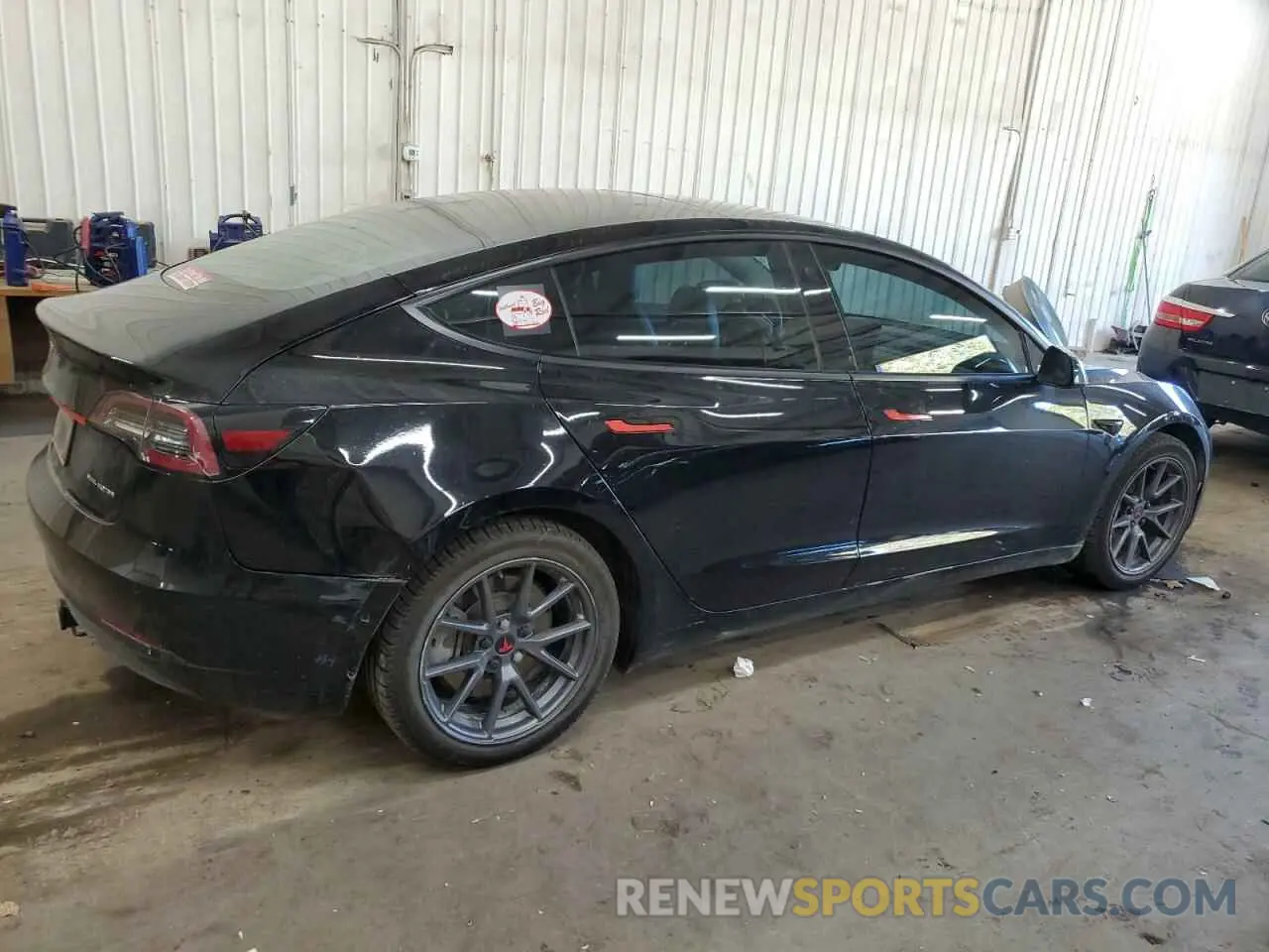3 Photograph of a damaged car 5YJ3E1EB1MF857949 TESLA MODEL 3 2021