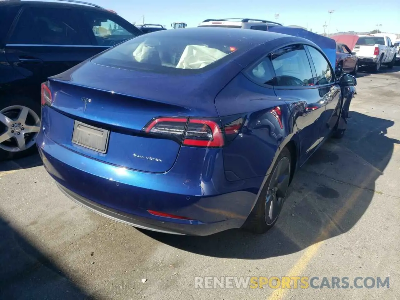 4 Photograph of a damaged car 5YJ3E1EB1MF876887 TESLA MODEL 3 2021