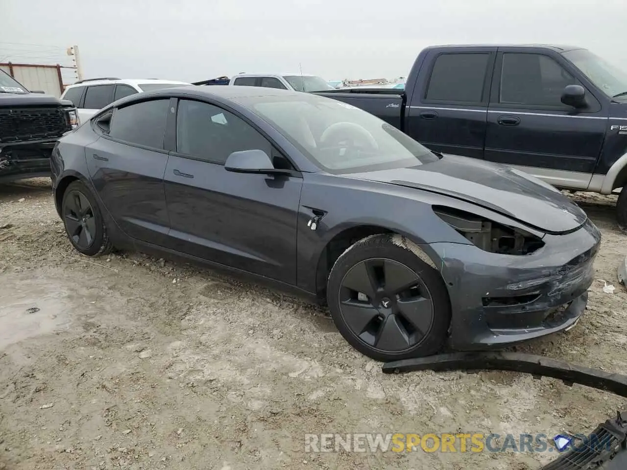 4 Photograph of a damaged car 5YJ3E1EB1MF974852 TESLA MODEL 3 2021
