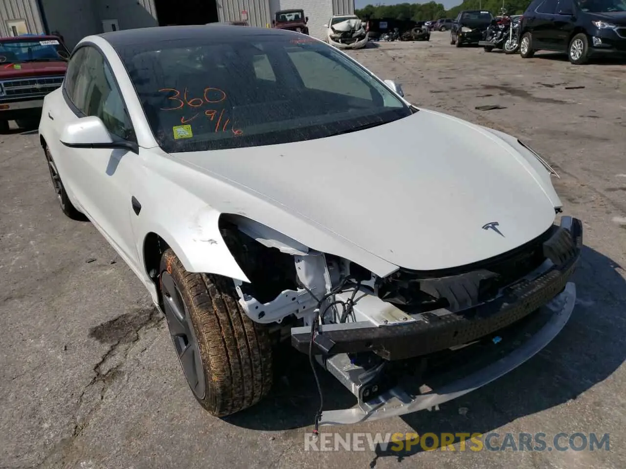 1 Photograph of a damaged car 5YJ3E1EB1MF979128 TESLA MODEL 3 2021