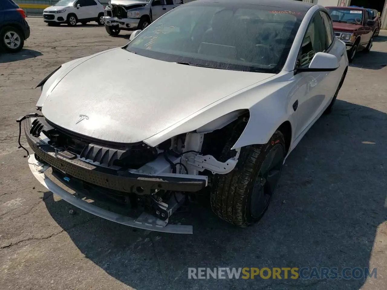2 Photograph of a damaged car 5YJ3E1EB1MF979128 TESLA MODEL 3 2021