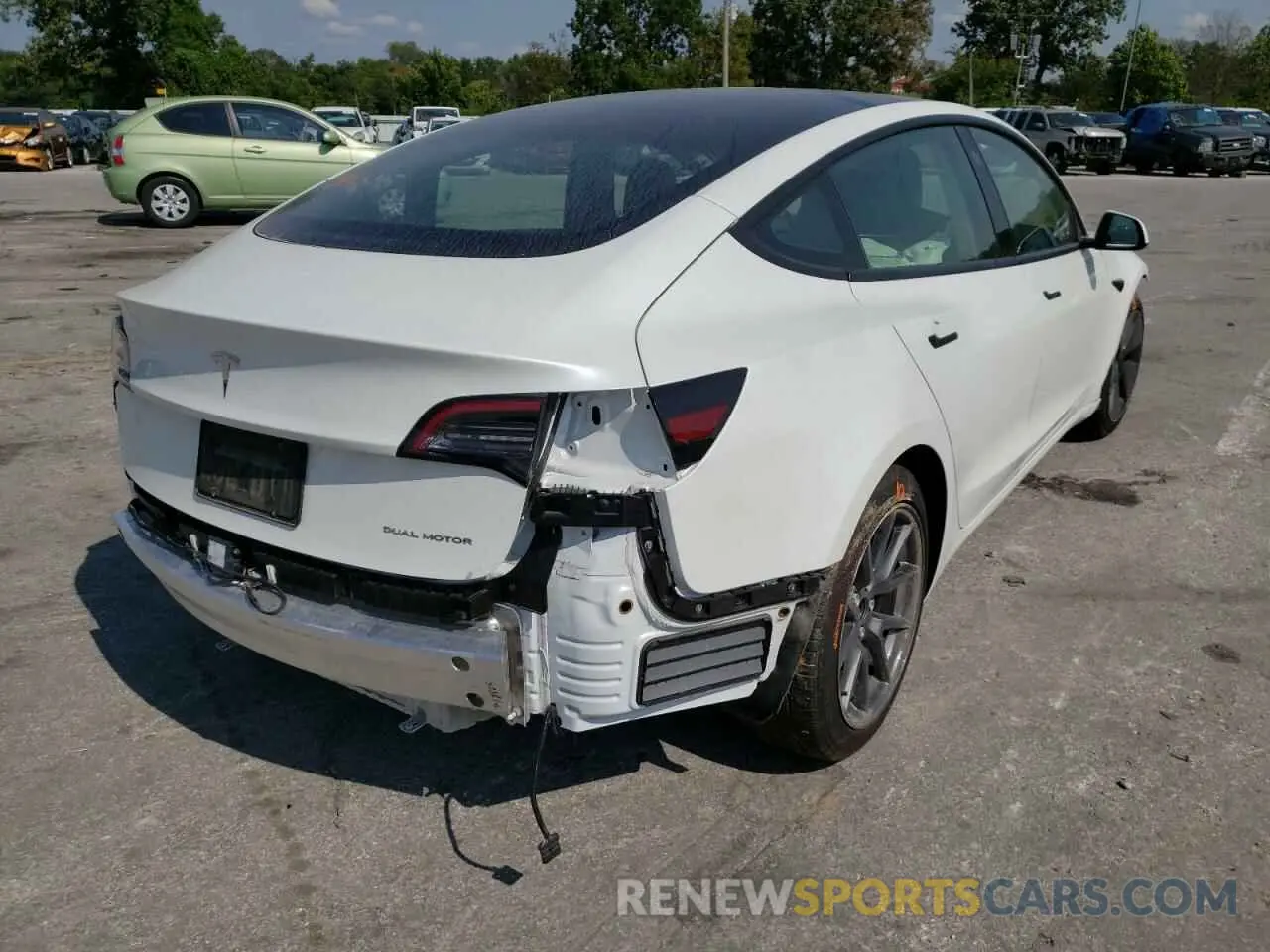 4 Photograph of a damaged car 5YJ3E1EB1MF979128 TESLA MODEL 3 2021
