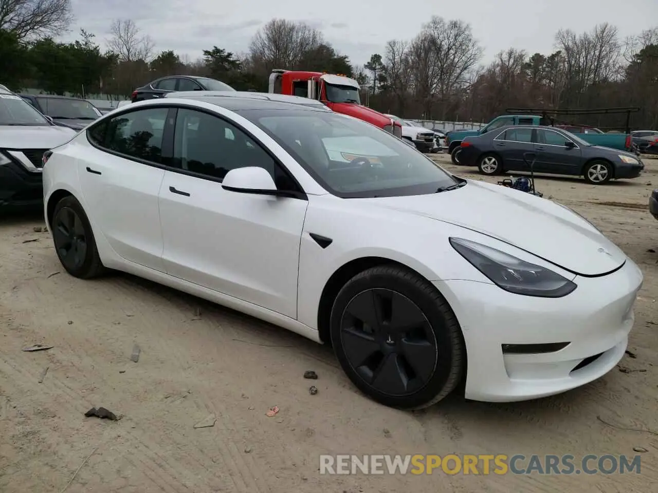 4 Photograph of a damaged car 5YJ3E1EB1MF980098 TESLA MODEL 3 2021