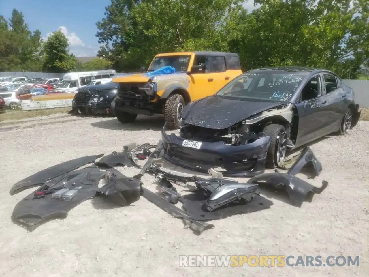 2 Photograph of a damaged car 5YJ3E1EB2MF044474 TESLA MODEL 3 2021