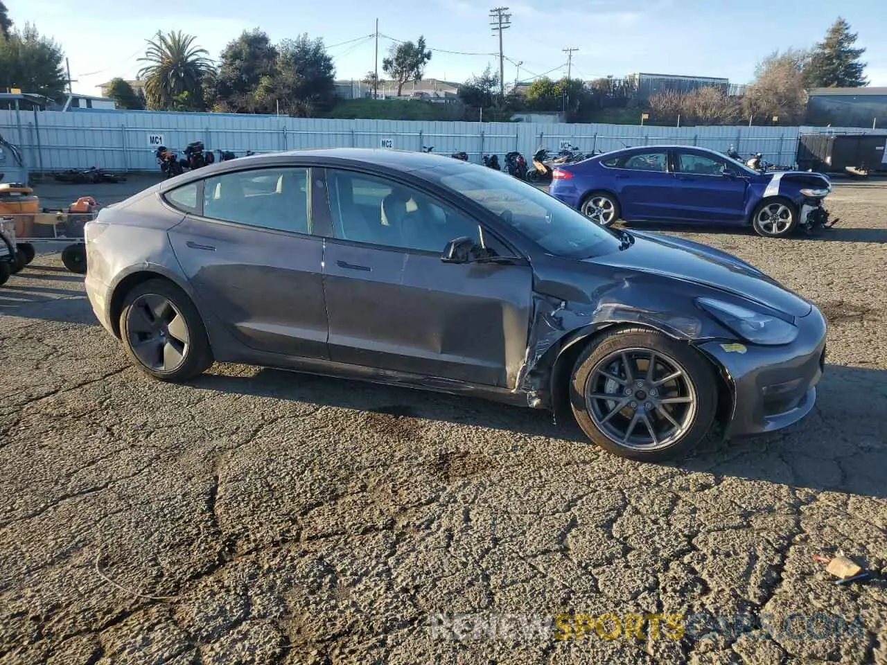 4 Photograph of a damaged car 5YJ3E1EB2MF076308 TESLA MODEL 3 2021