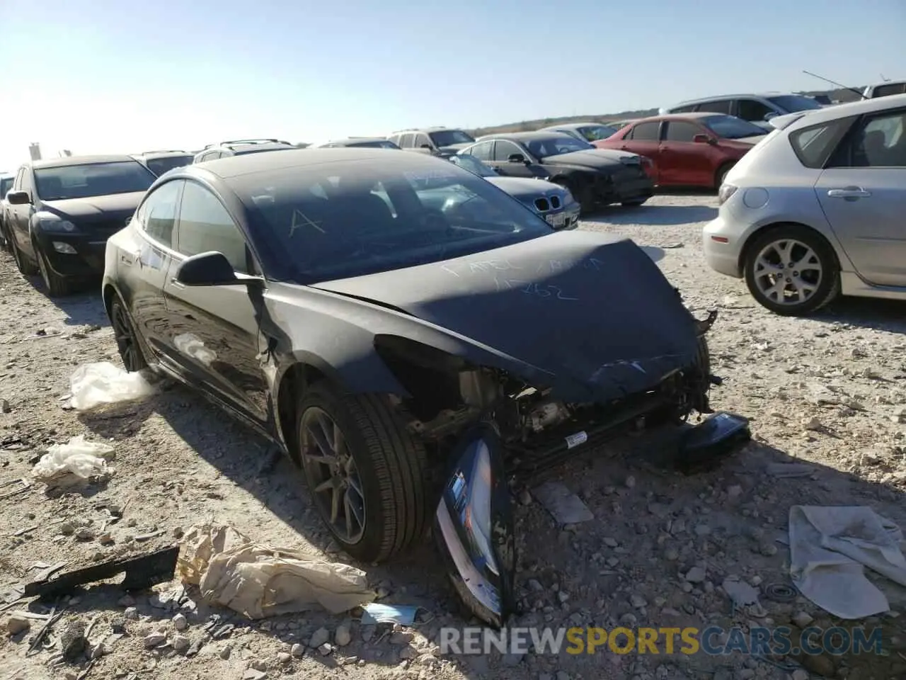 1 Photograph of a damaged car 5YJ3E1EB2MF848953 TESLA MODEL 3 2021