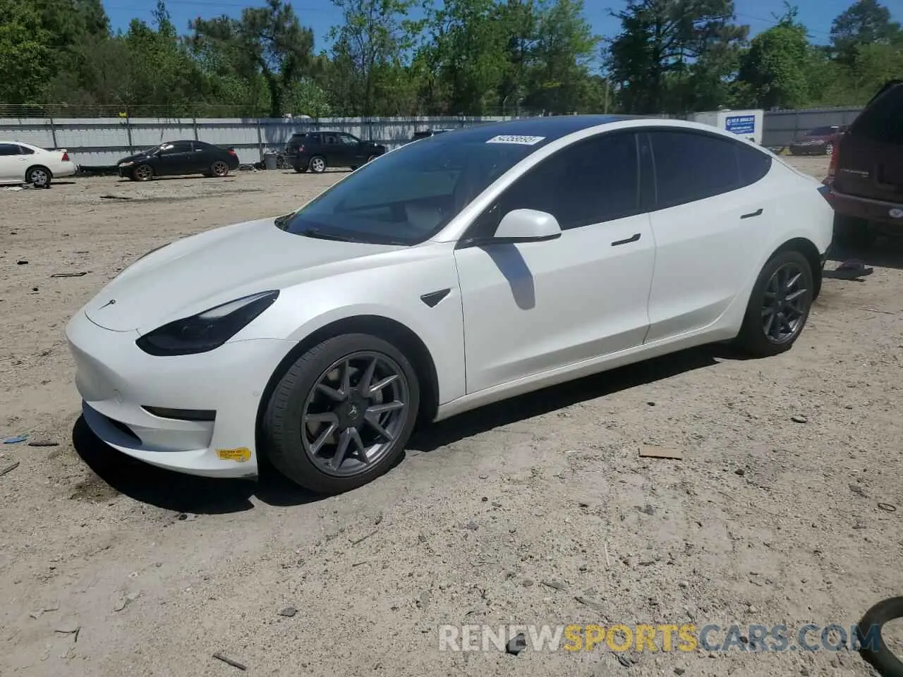 1 Photograph of a damaged car 5YJ3E1EB2MF937020 TESLA MODEL 3 2021