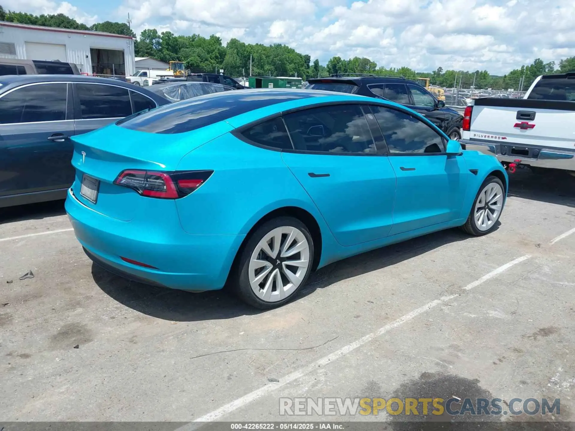 4 Фотография поврежденного автомобиля 5YJ3E1EB2MF990302 TESLA MODEL 3 2021
