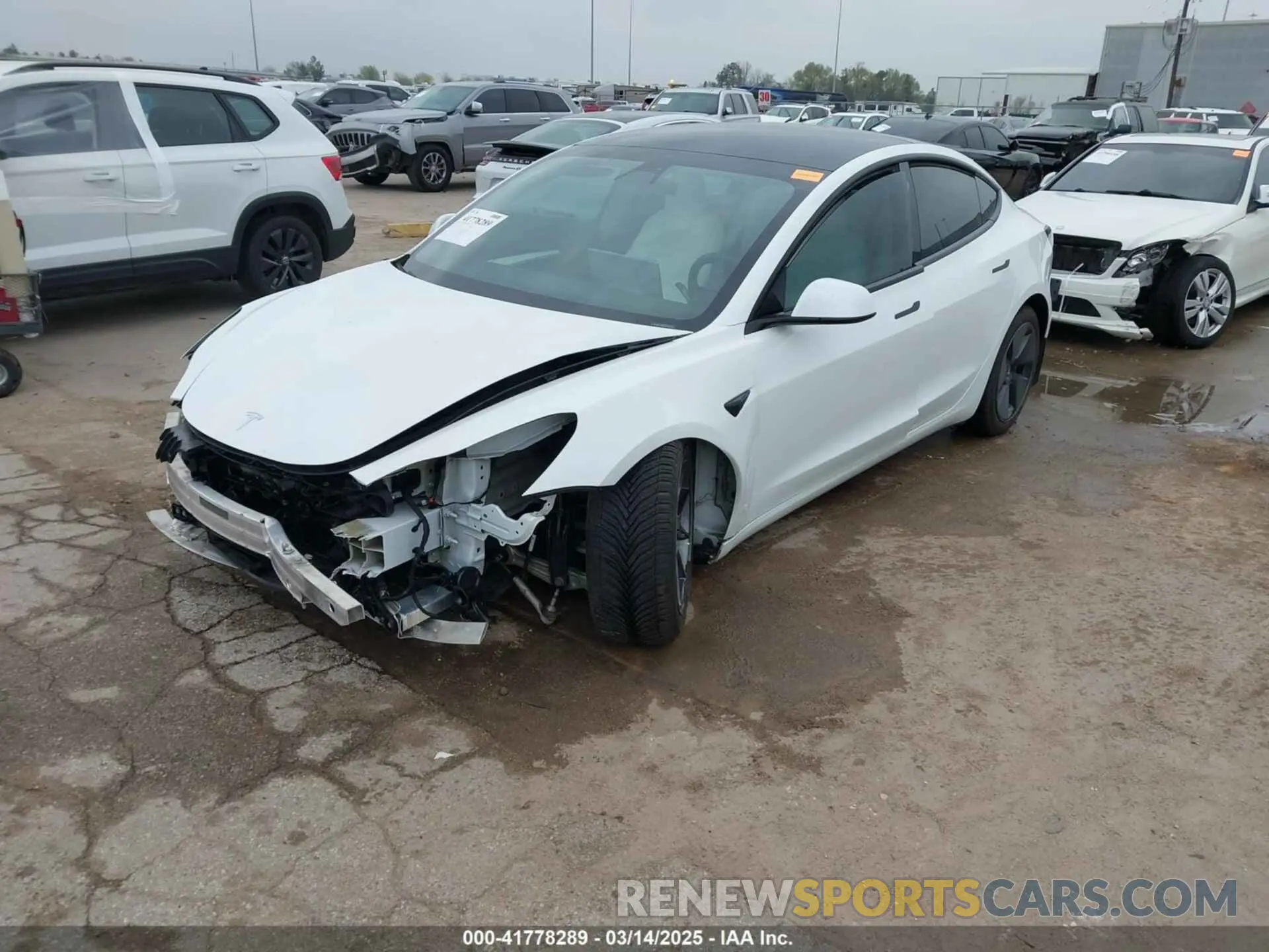 2 Photograph of a damaged car 5YJ3E1EB3MF059713 TESLA MODEL 3 2021