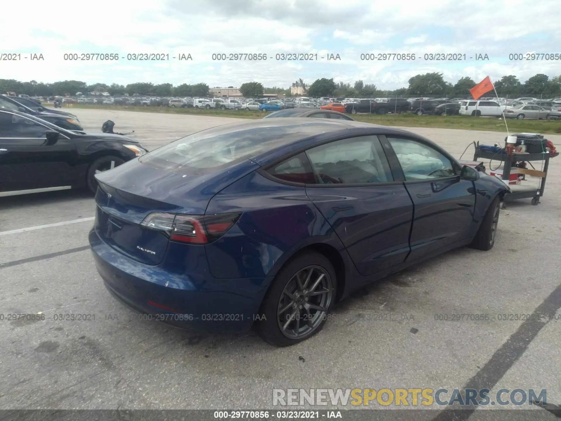 4 Photograph of a damaged car 5YJ3E1EB3MF836987 TESLA MODEL 3 2021