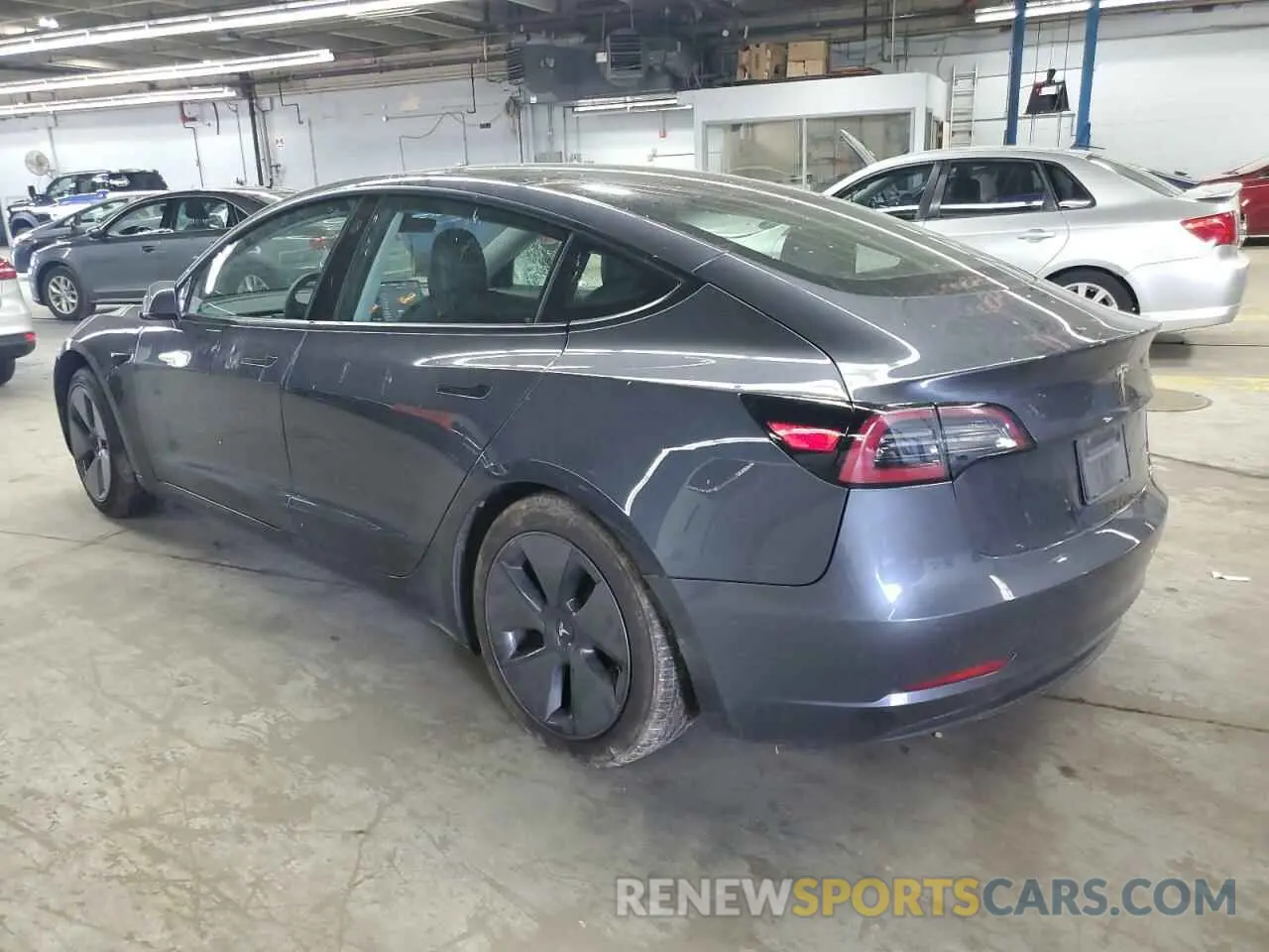 2 Photograph of a damaged car 5YJ3E1EB3MF848122 TESLA MODEL 3 2021