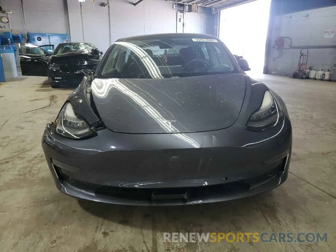 5 Photograph of a damaged car 5YJ3E1EB3MF848122 TESLA MODEL 3 2021
