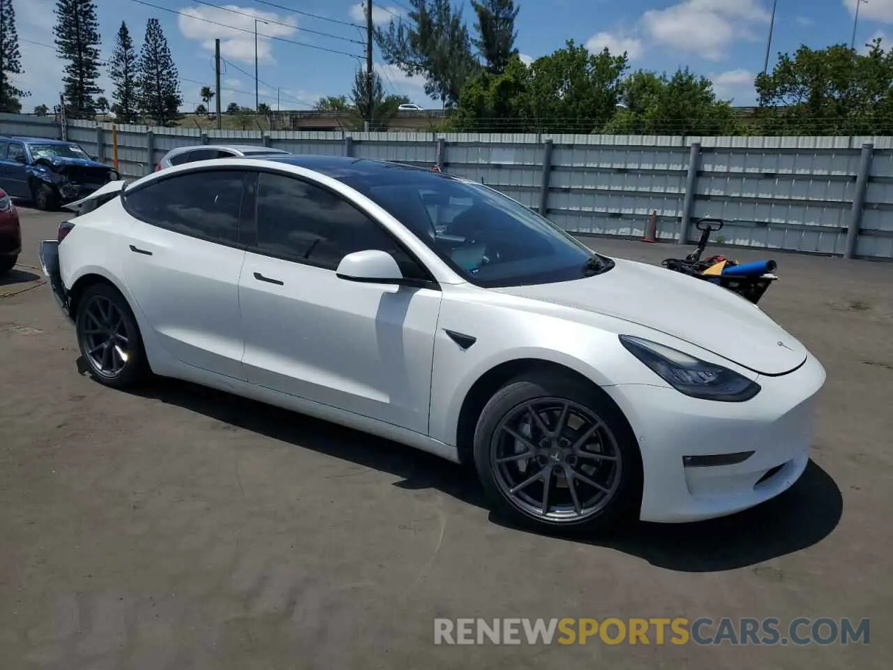 4 Photograph of a damaged car 5YJ3E1EB3MF855944 TESLA MODEL 3 2021
