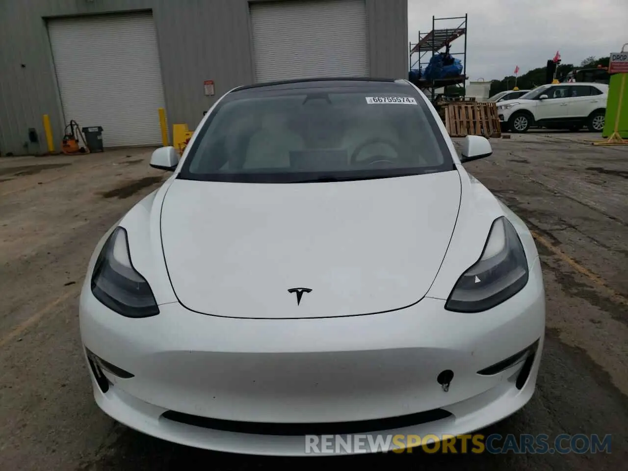 5 Photograph of a damaged car 5YJ3E1EB3MF871657 TESLA MODEL 3 2021
