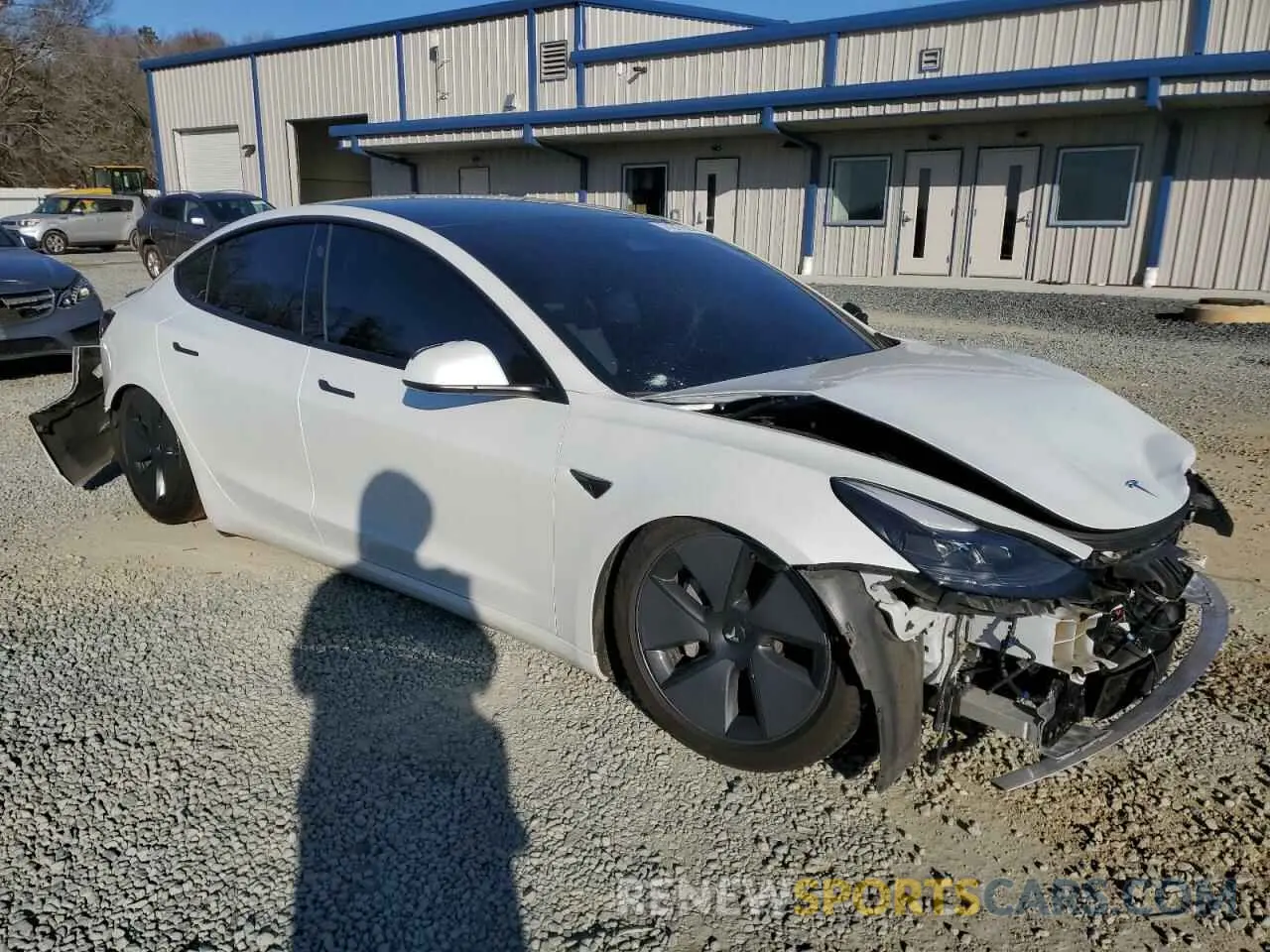 4 Photograph of a damaged car 5YJ3E1EB3MF925068 TESLA MODEL 3 2021