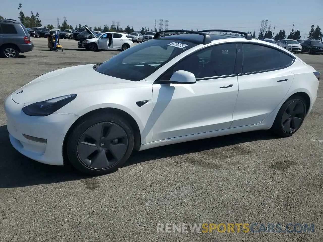 1 Photograph of a damaged car 5YJ3E1EB4MF002906 TESLA MODEL 3 2021
