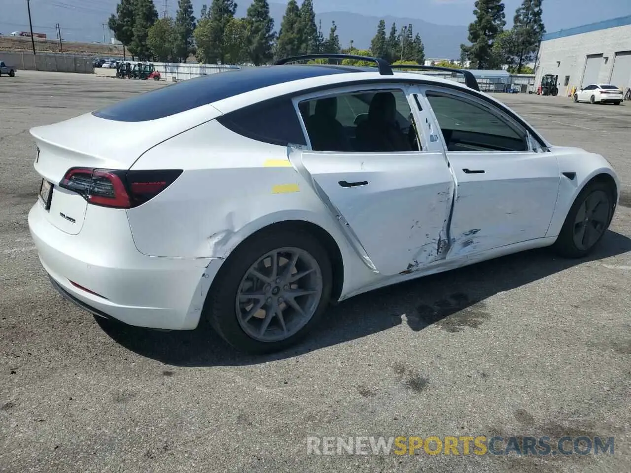 3 Photograph of a damaged car 5YJ3E1EB4MF002906 TESLA MODEL 3 2021