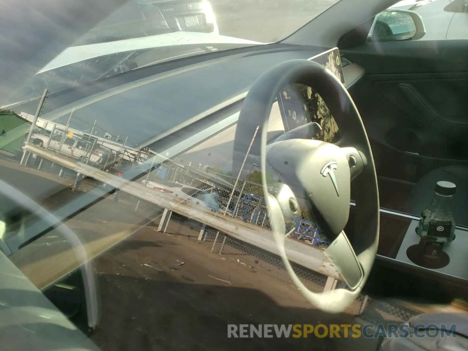 8 Photograph of a damaged car 5YJ3E1EB4MF869769 TESLA MODEL 3 2021