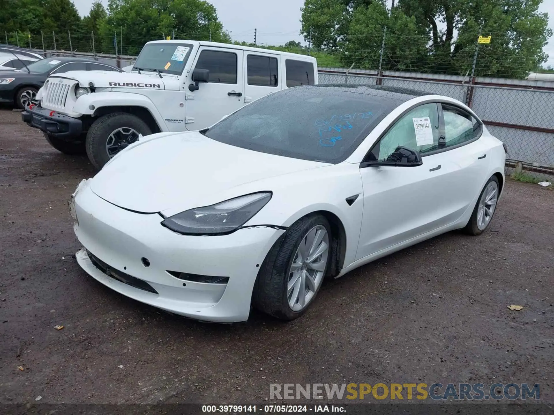 2 Photograph of a damaged car 5YJ3E1EB6MF048950 TESLA MODEL 3 2021