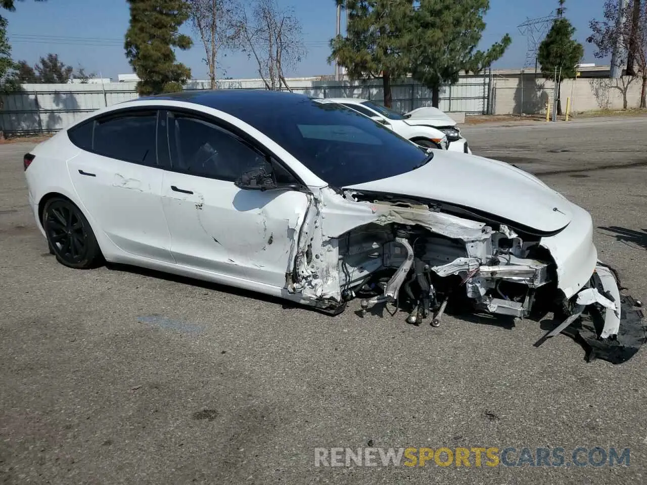 4 Photograph of a damaged car 5YJ3E1EB6MF073590 TESLA MODEL 3 2021