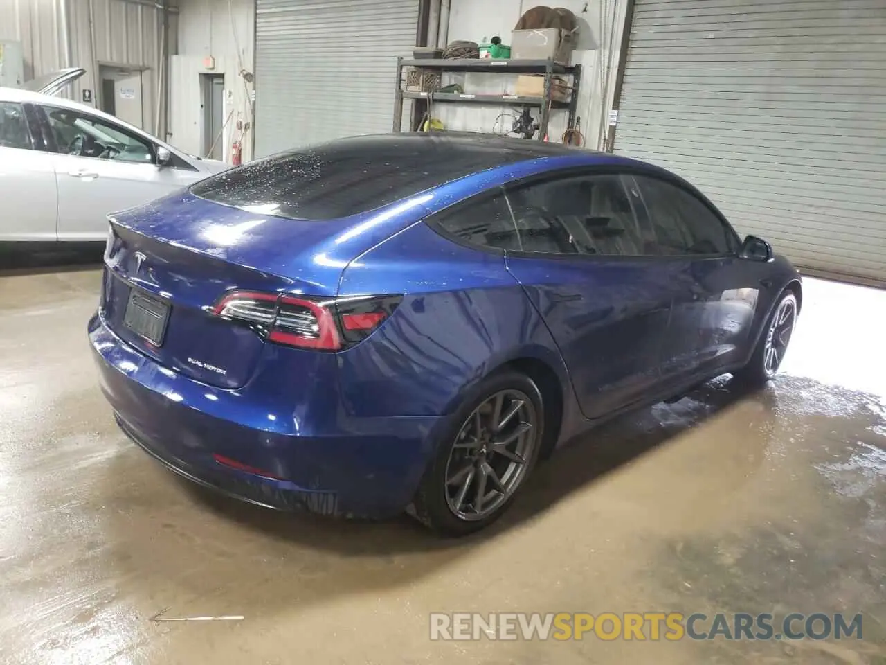 3 Photograph of a damaged car 5YJ3E1EB7MF066860 TESLA MODEL 3 2021