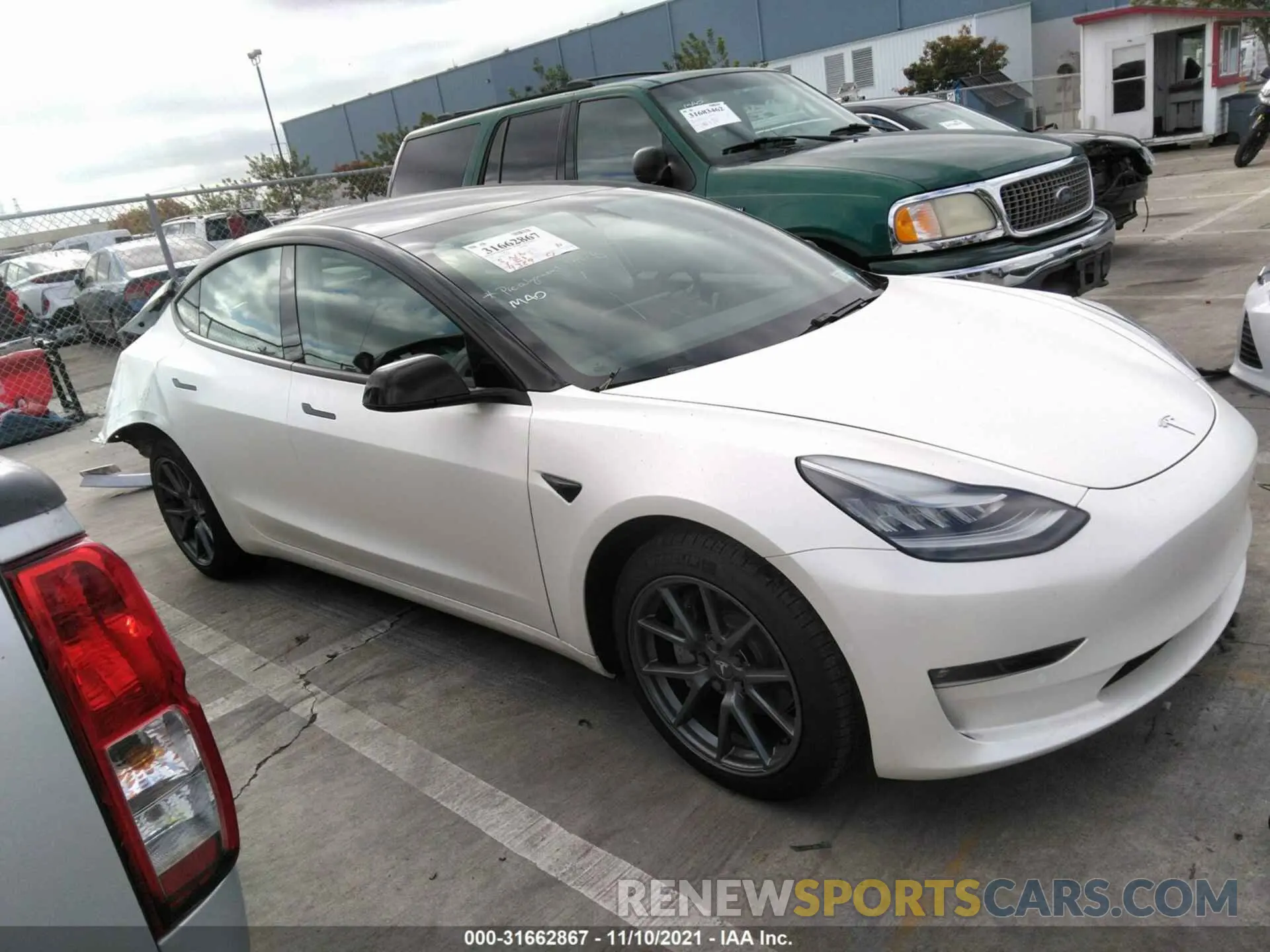 1 Photograph of a damaged car 5YJ3E1EB7MF852903 TESLA MODEL 3 2021