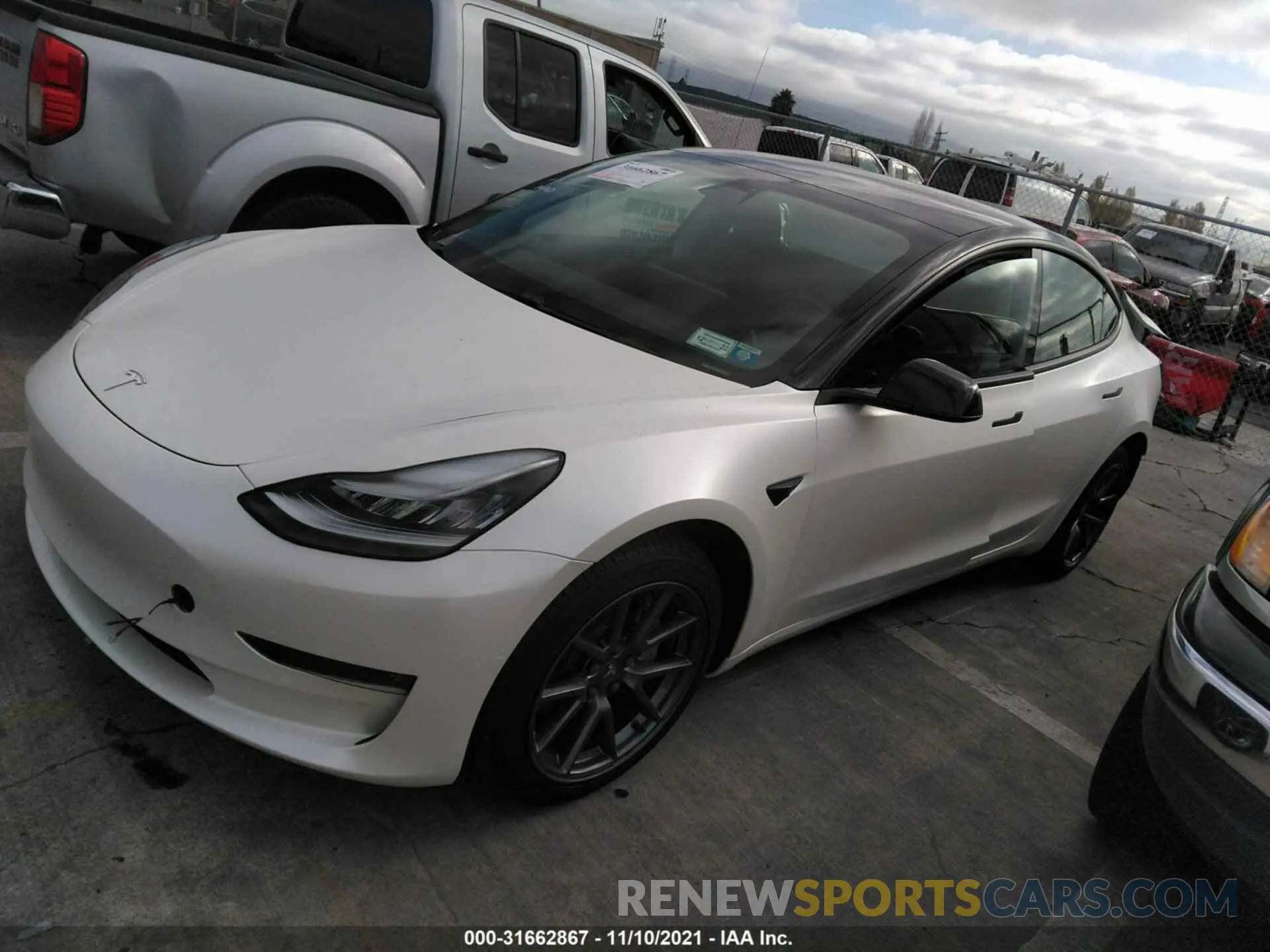 2 Photograph of a damaged car 5YJ3E1EB7MF852903 TESLA MODEL 3 2021