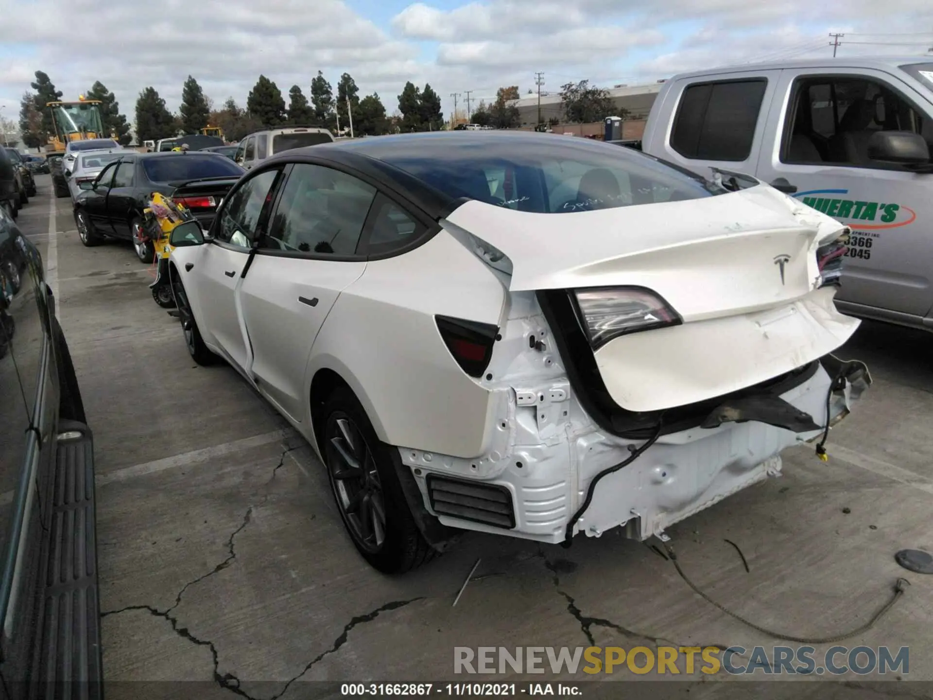 3 Photograph of a damaged car 5YJ3E1EB7MF852903 TESLA MODEL 3 2021