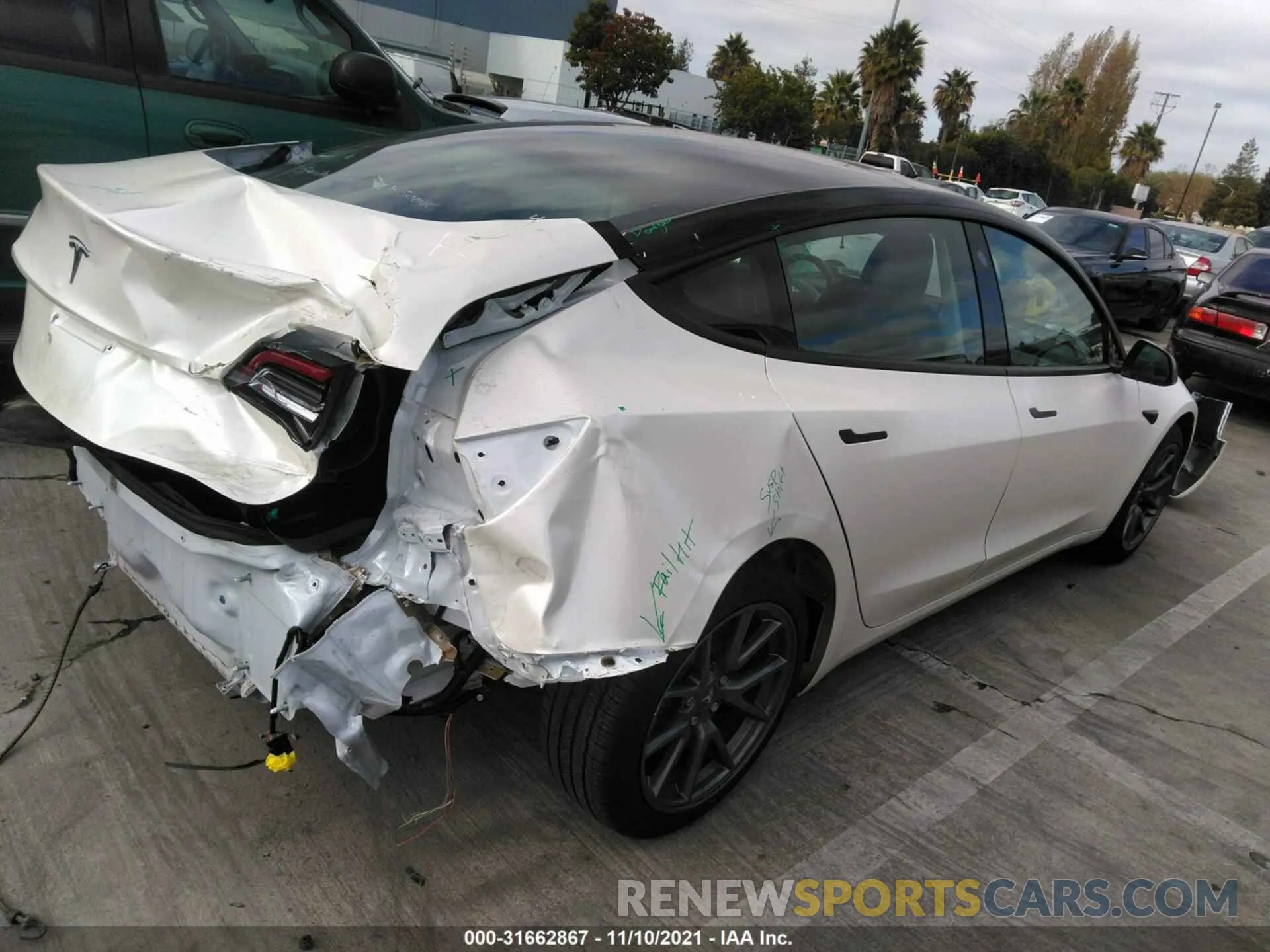 4 Photograph of a damaged car 5YJ3E1EB7MF852903 TESLA MODEL 3 2021